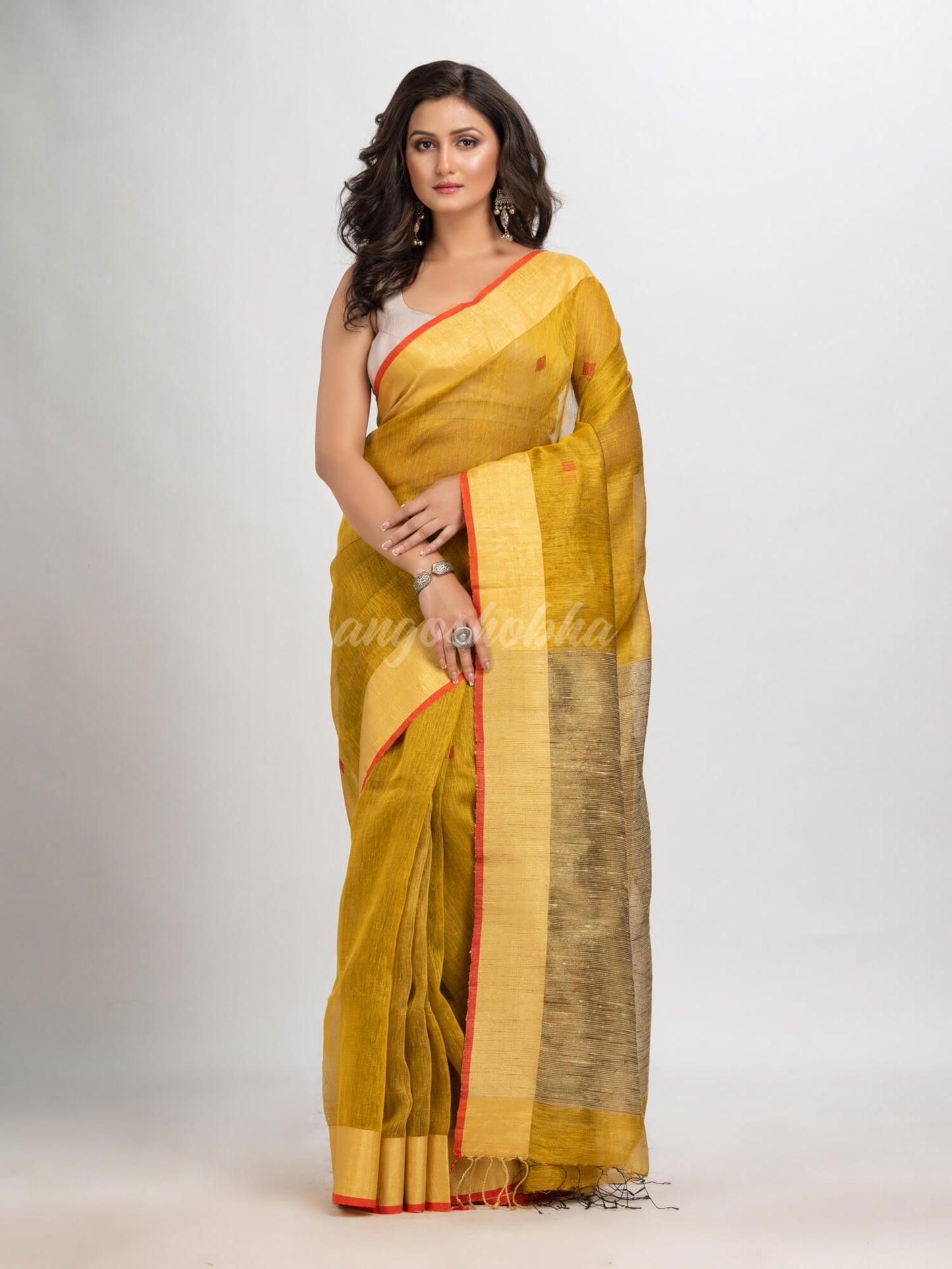 Mustard silk blend linen with  solid border jamdani saree