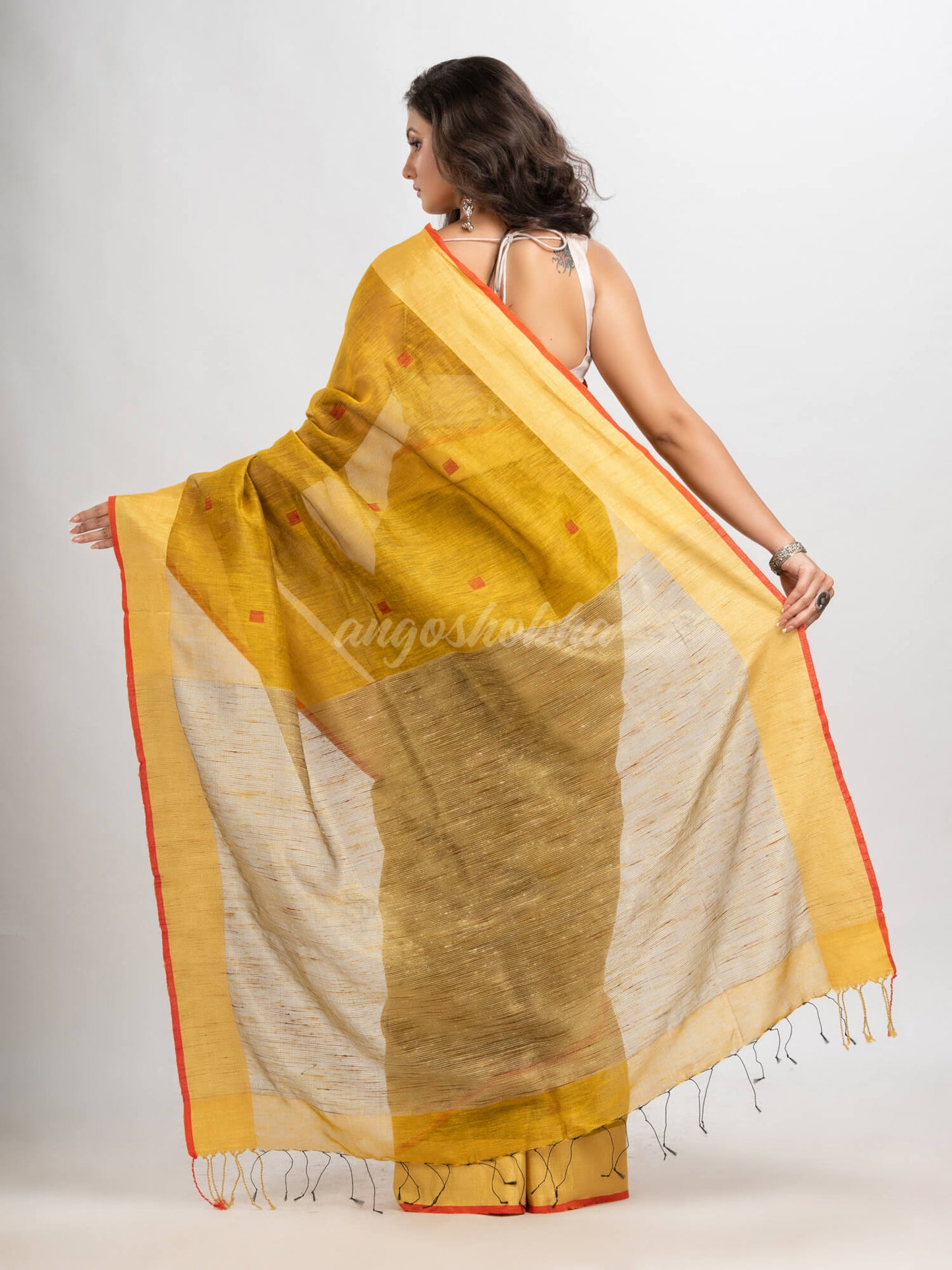 Mustard silk blend linen with  solid border jamdani saree