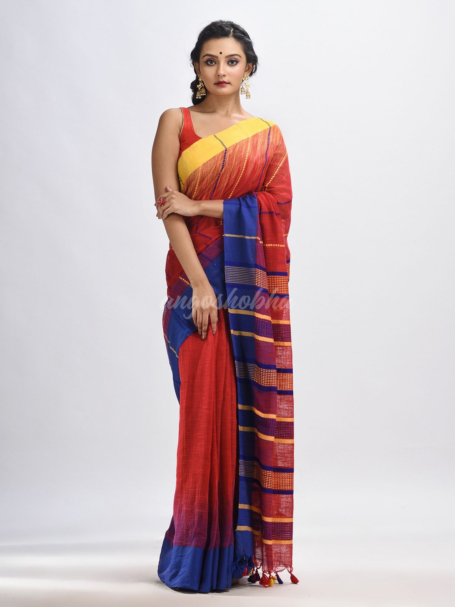 Red cotton tai dai with solid broder in multi colour pallu hondwaven saree