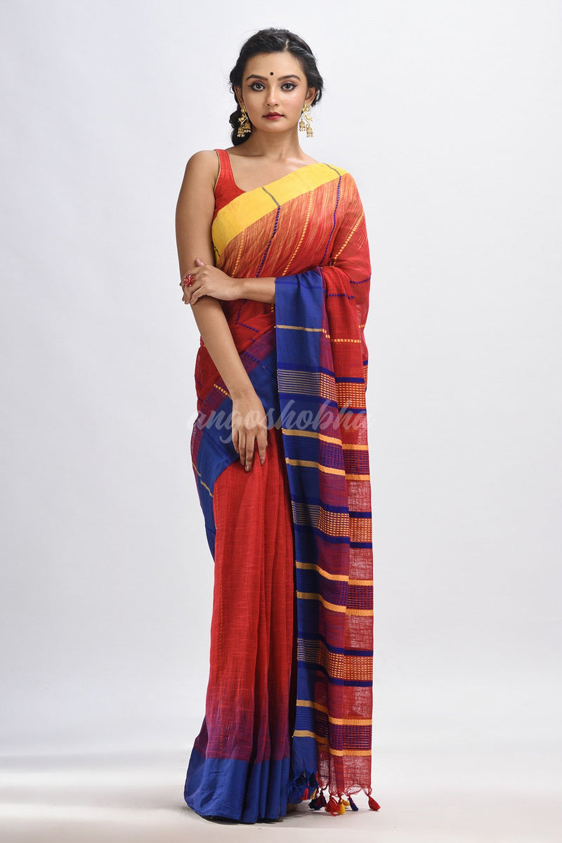 Red cotton tai dai with solid broder in multi colour pallu hondwaven saree