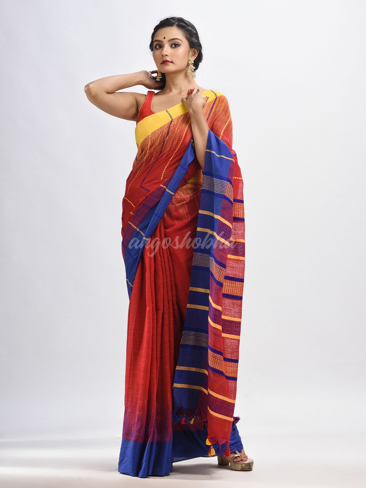 Red cotton tai dai with solid broder in multi colour pallu hondwaven saree