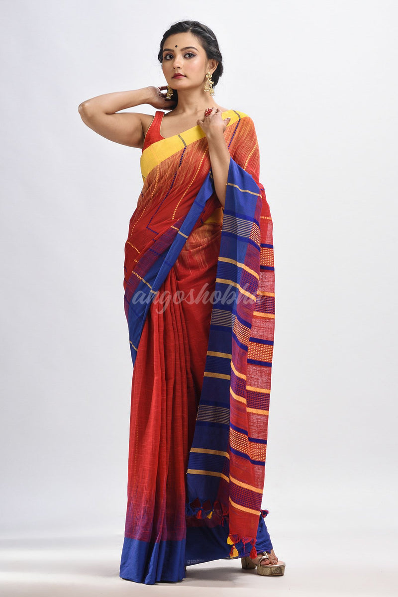 Red cotton tai dai with solid broder in multi colour pallu hondwaven saree