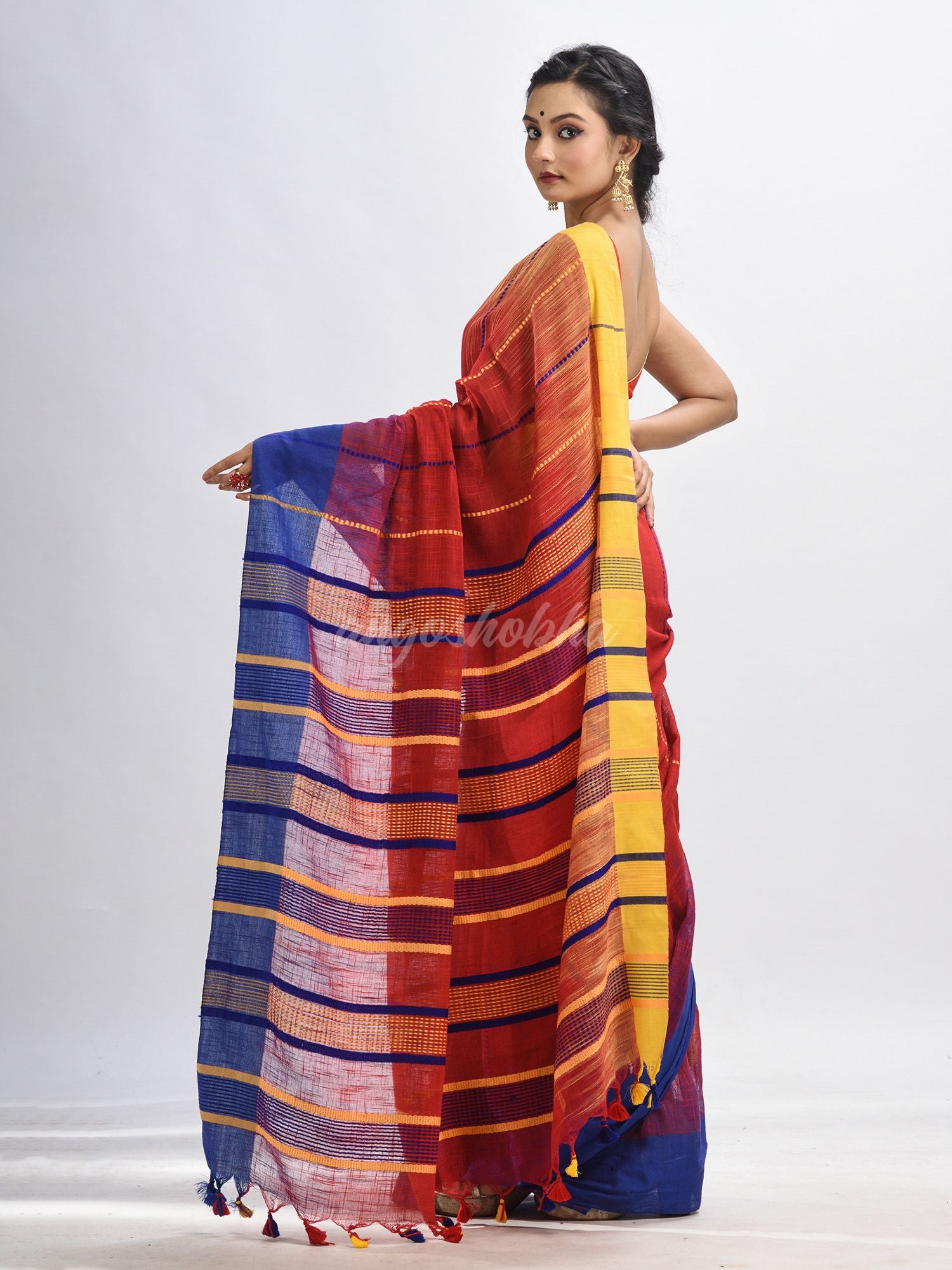 Red cotton tai dai with solid broder in multi colour pallu hondwaven saree