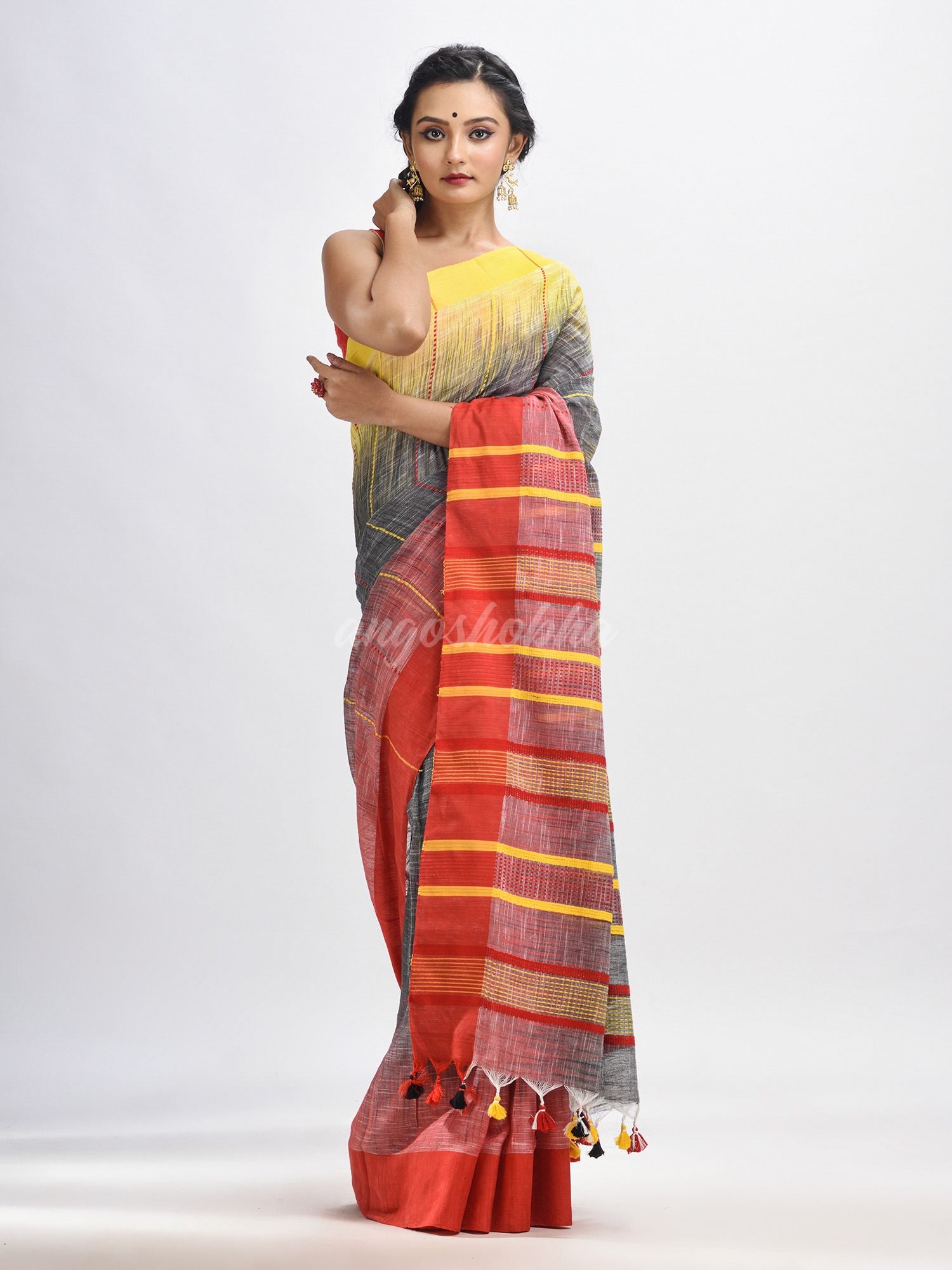 Grey cotton tai dai with solid broder in multi colour pallu hondwaven saree