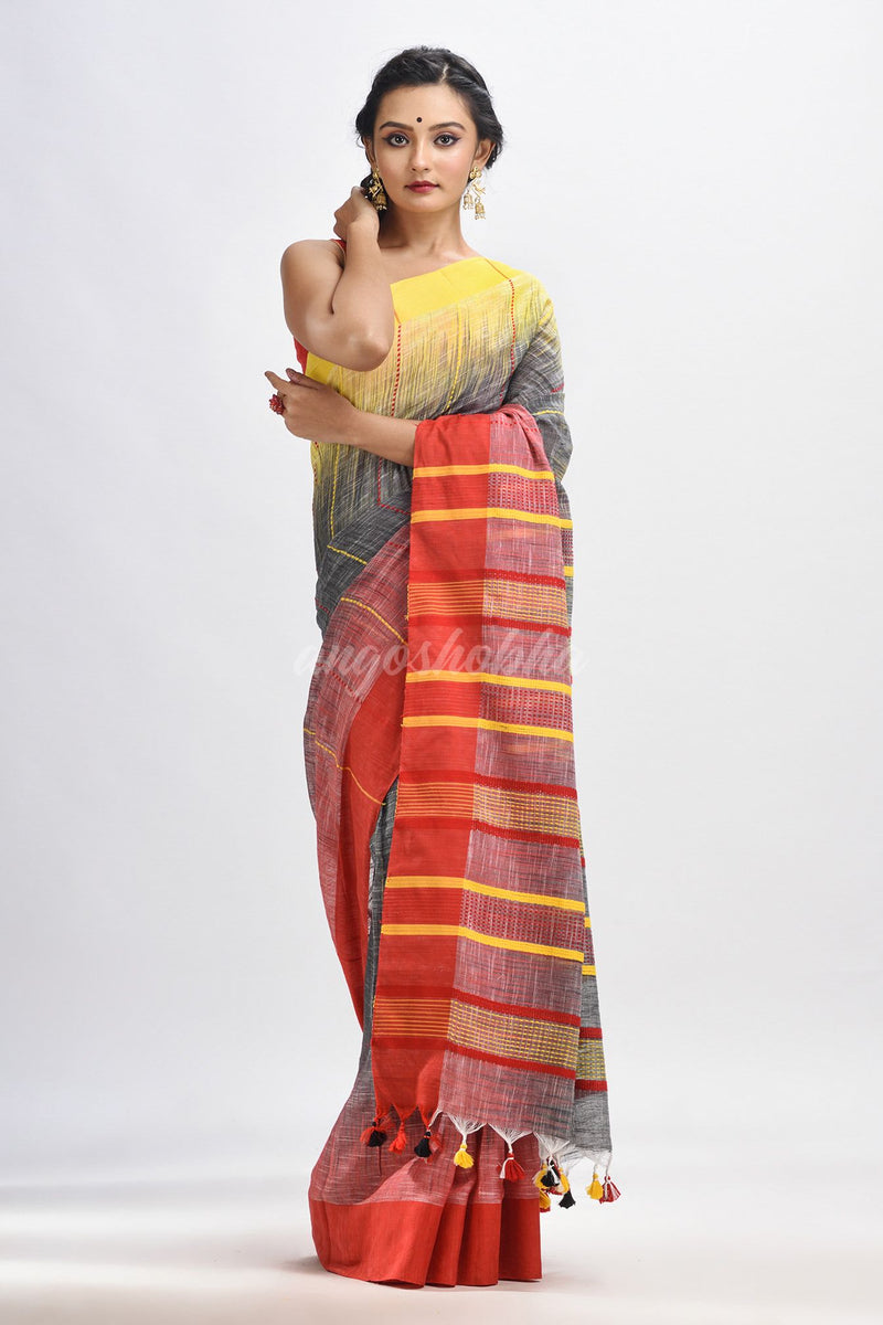 Grey cotton tai dai with solid broder in multi colour pallu hondwaven saree