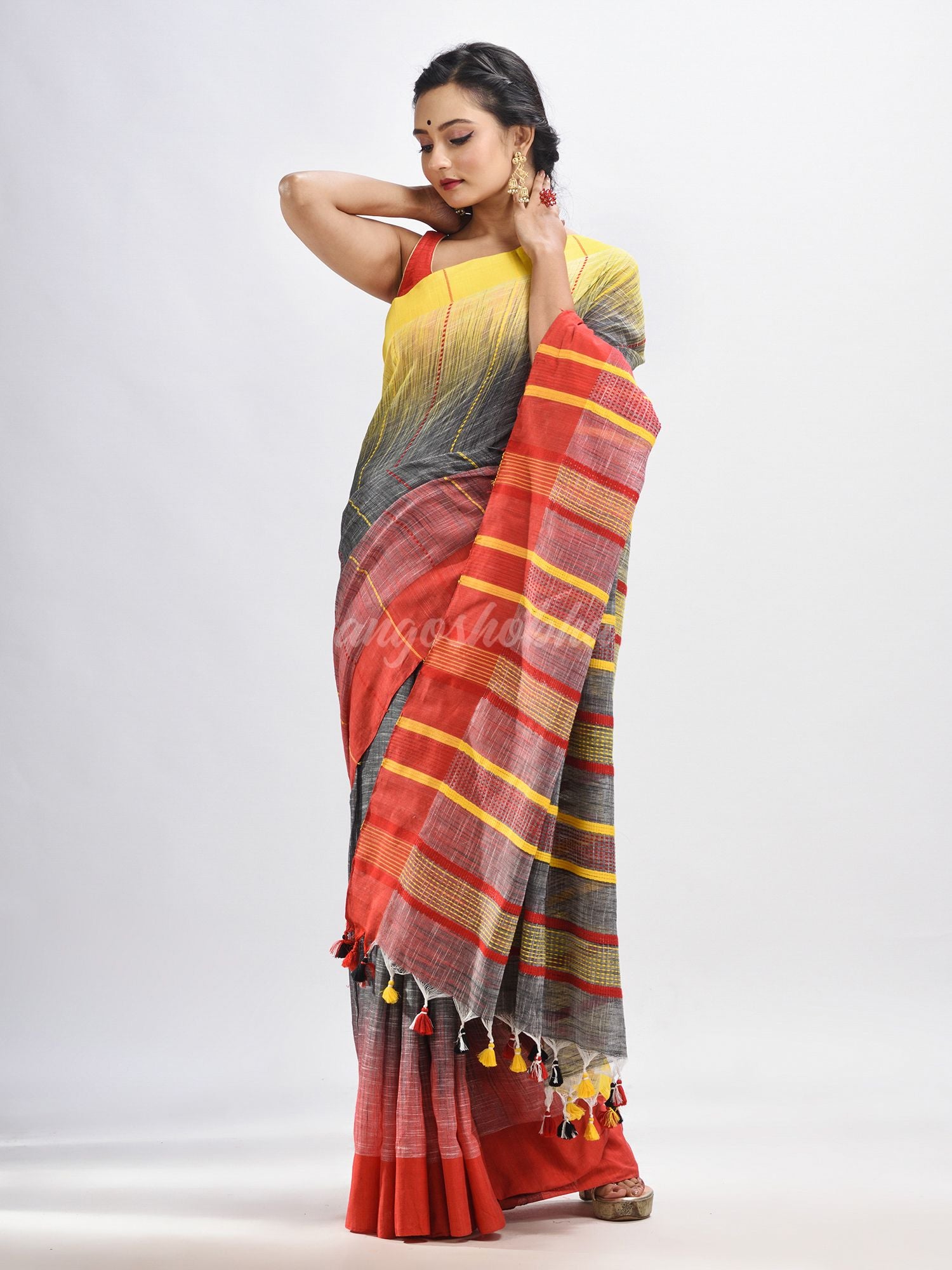 Grey cotton tai dai with solid broder in multi colour pallu hondwaven saree