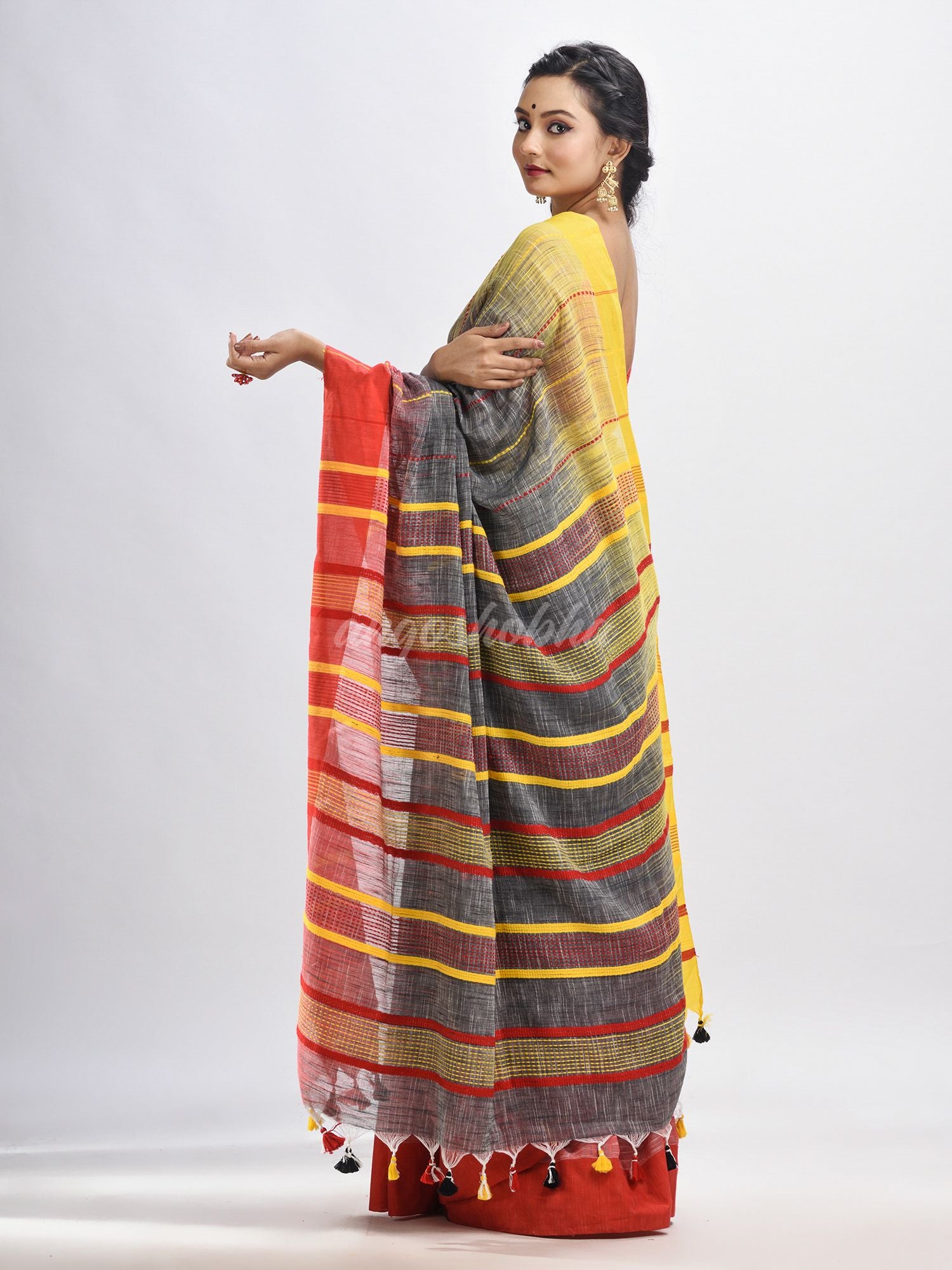 Grey cotton tai dai with solid broder in multi colour pallu hondwaven saree
