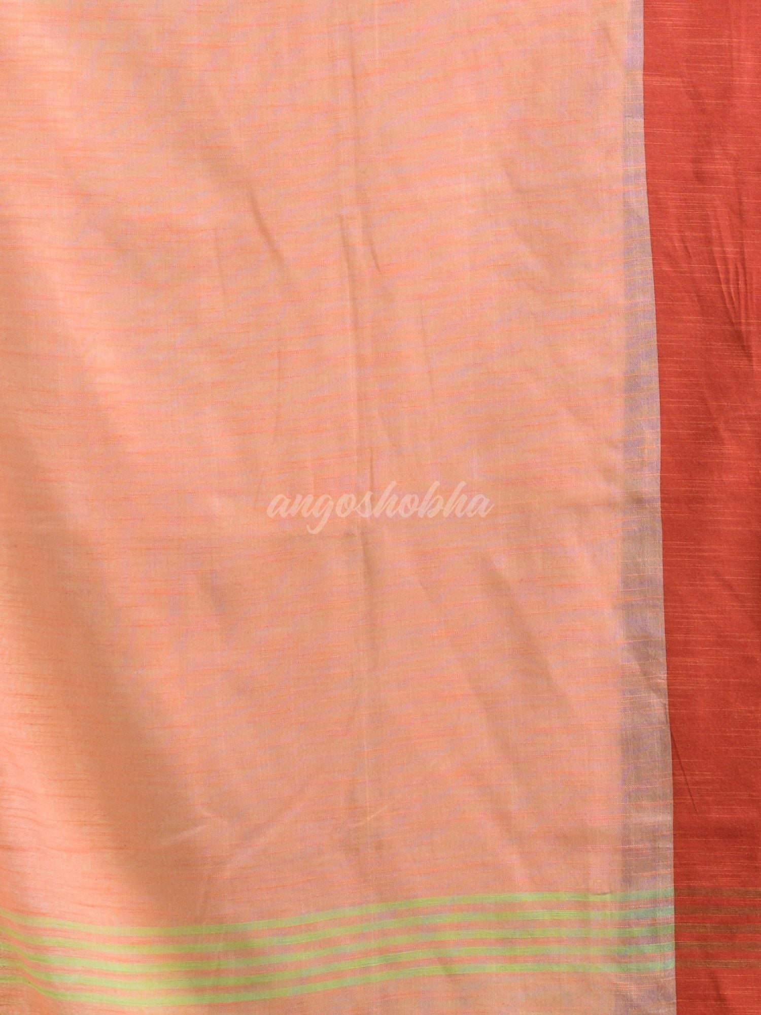 Light green cotton with solid body in tawny peach pallu handloom saree
