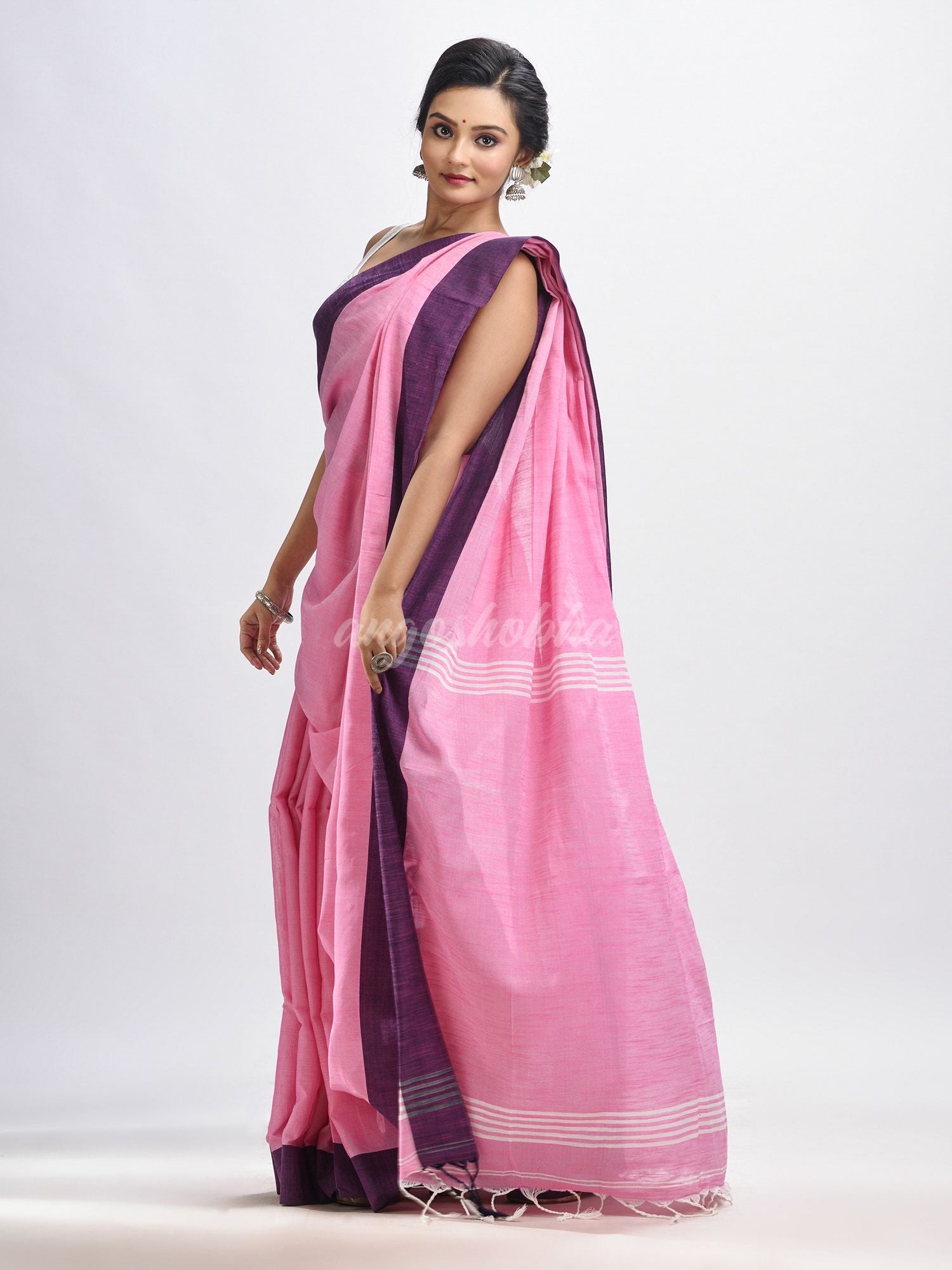 Pink cotton solid body handloom saree