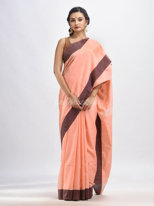 Peach cotton solid body handloom saree