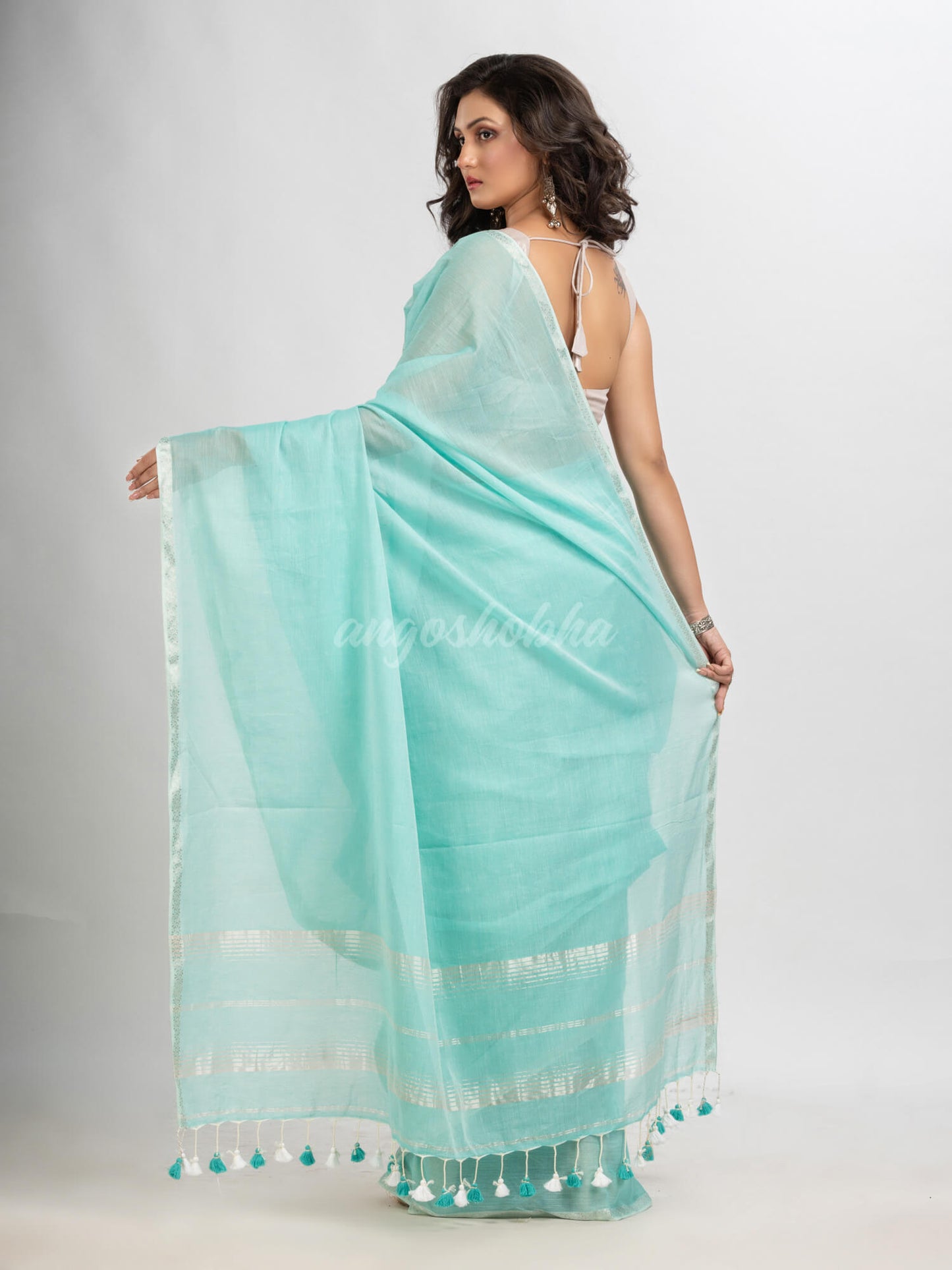 Paled Turquoise cotton with Jacquard Zari border and zari Stripe pallu handloom Saree