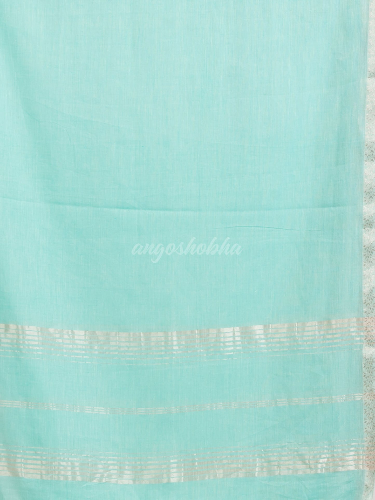 Paled Turquoise cotton with Jacquard Zari border and zari Stripe pallu handloom Saree