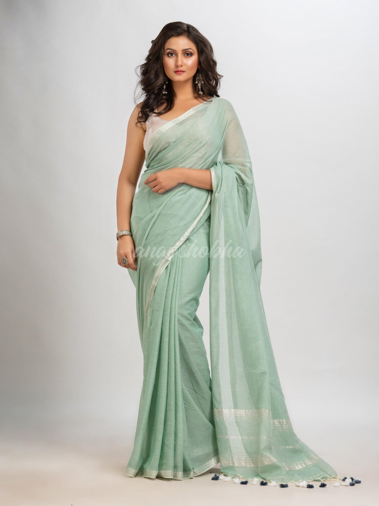 Sage green cotton with Jacquard Zari border and zari Stripe pallu handloom Saree