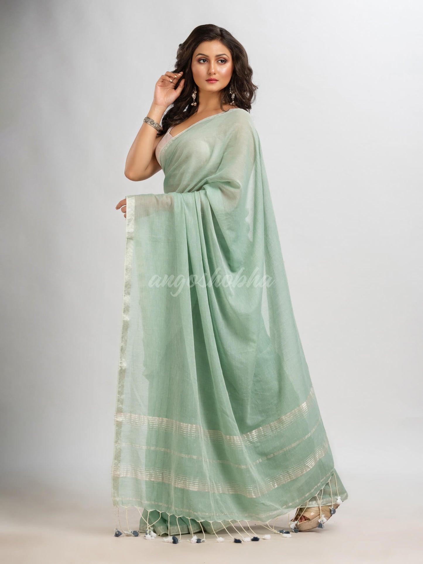 Sage green cotton with Jacquard Zari border and zari Stripe pallu handloom Saree