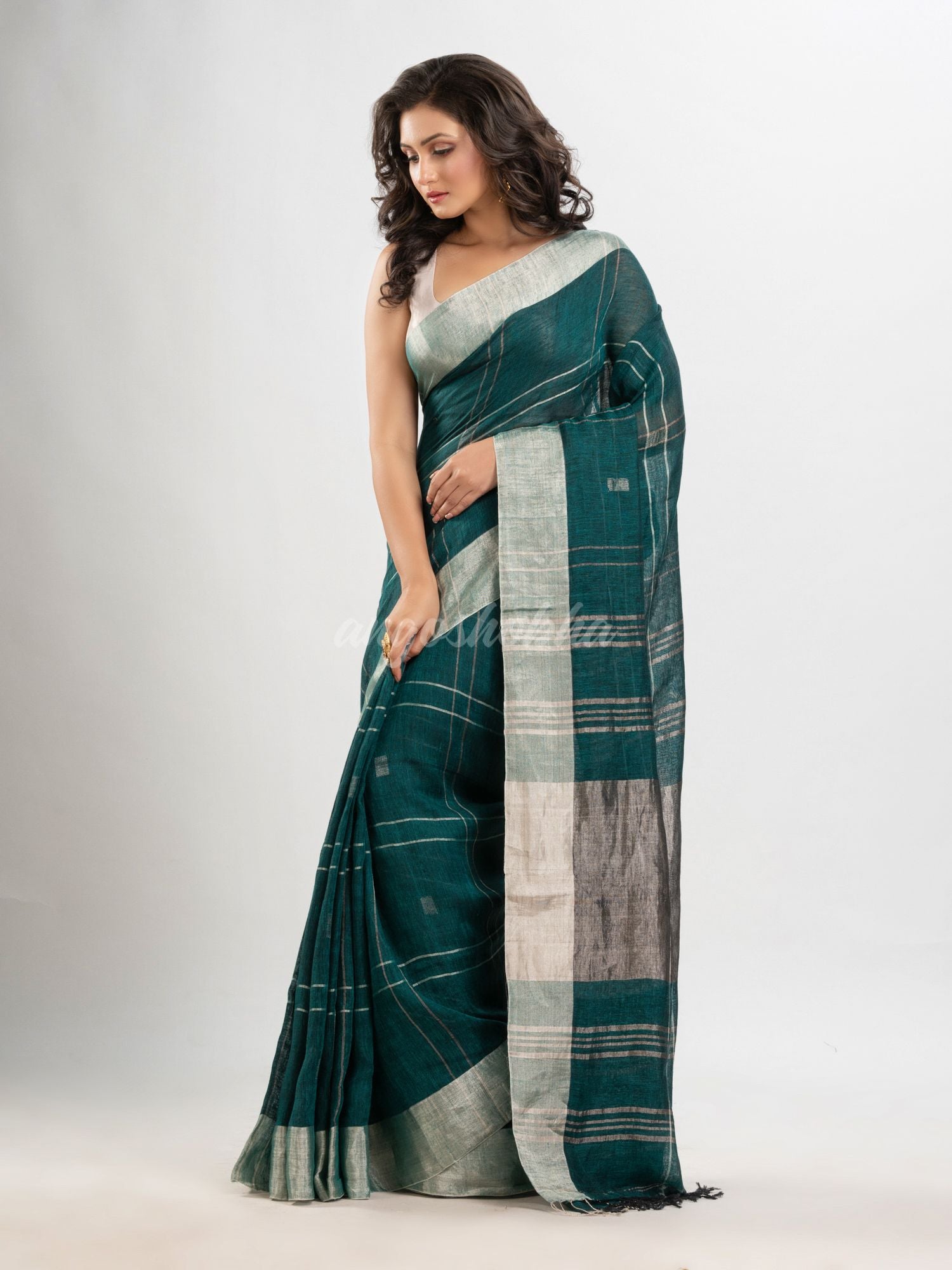 Forest green linen jamdani saree