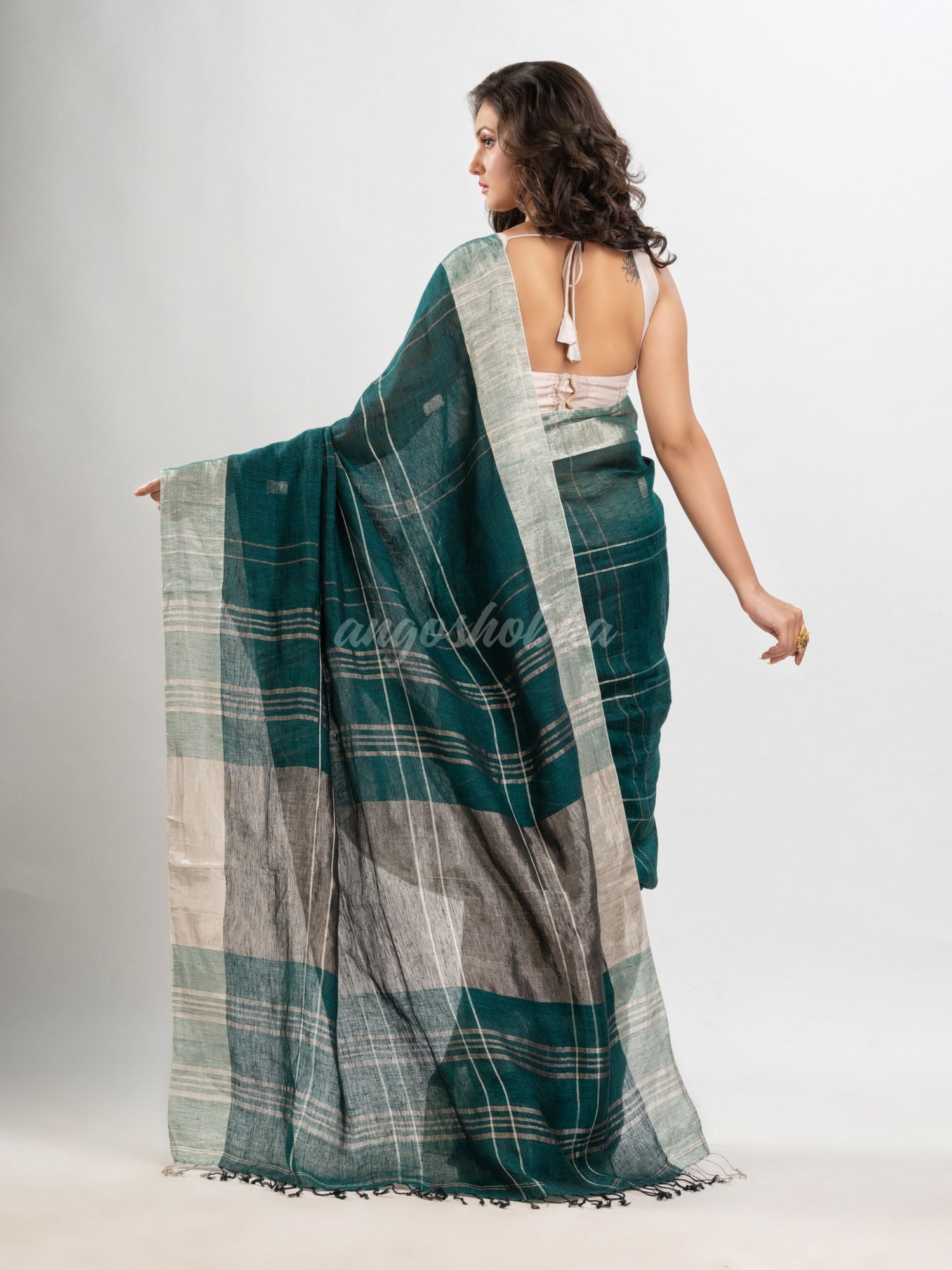 Forest green linen jamdani saree