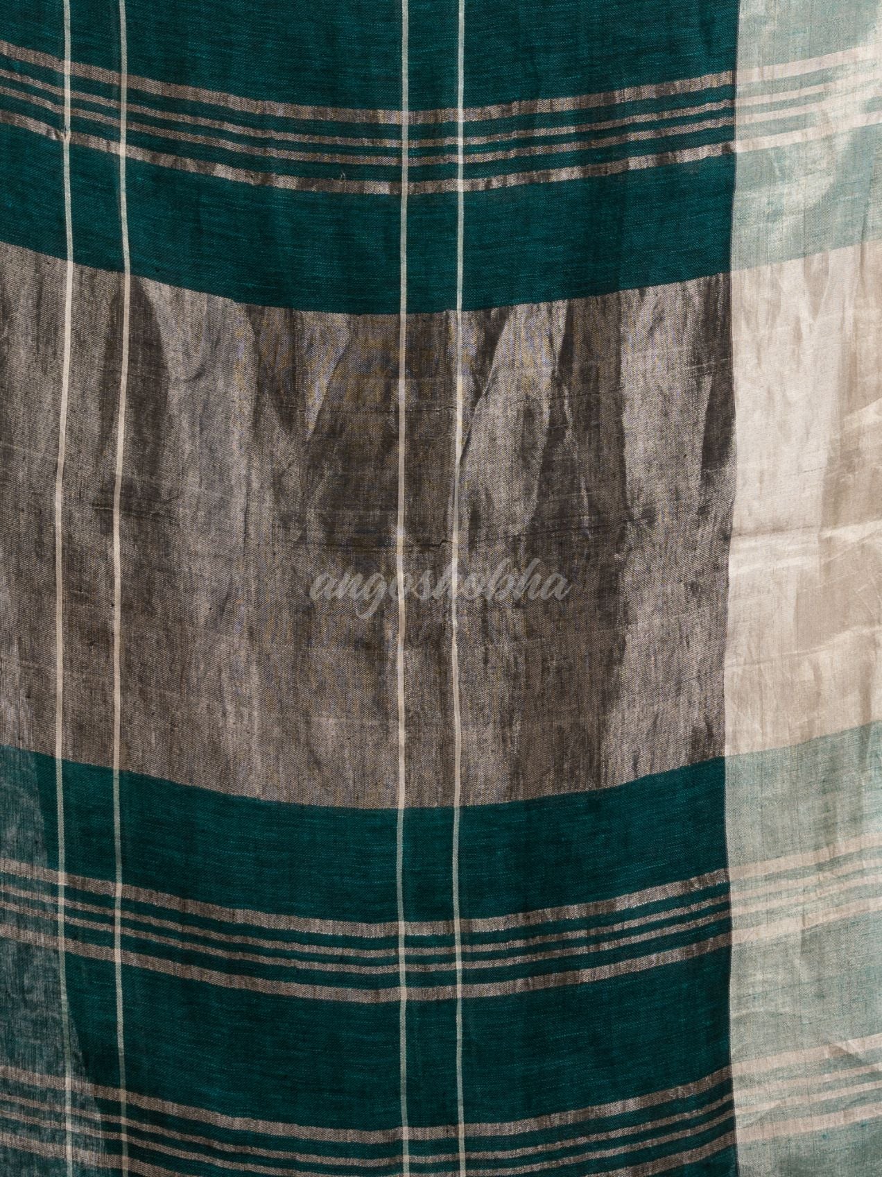Forest green linen jamdani saree