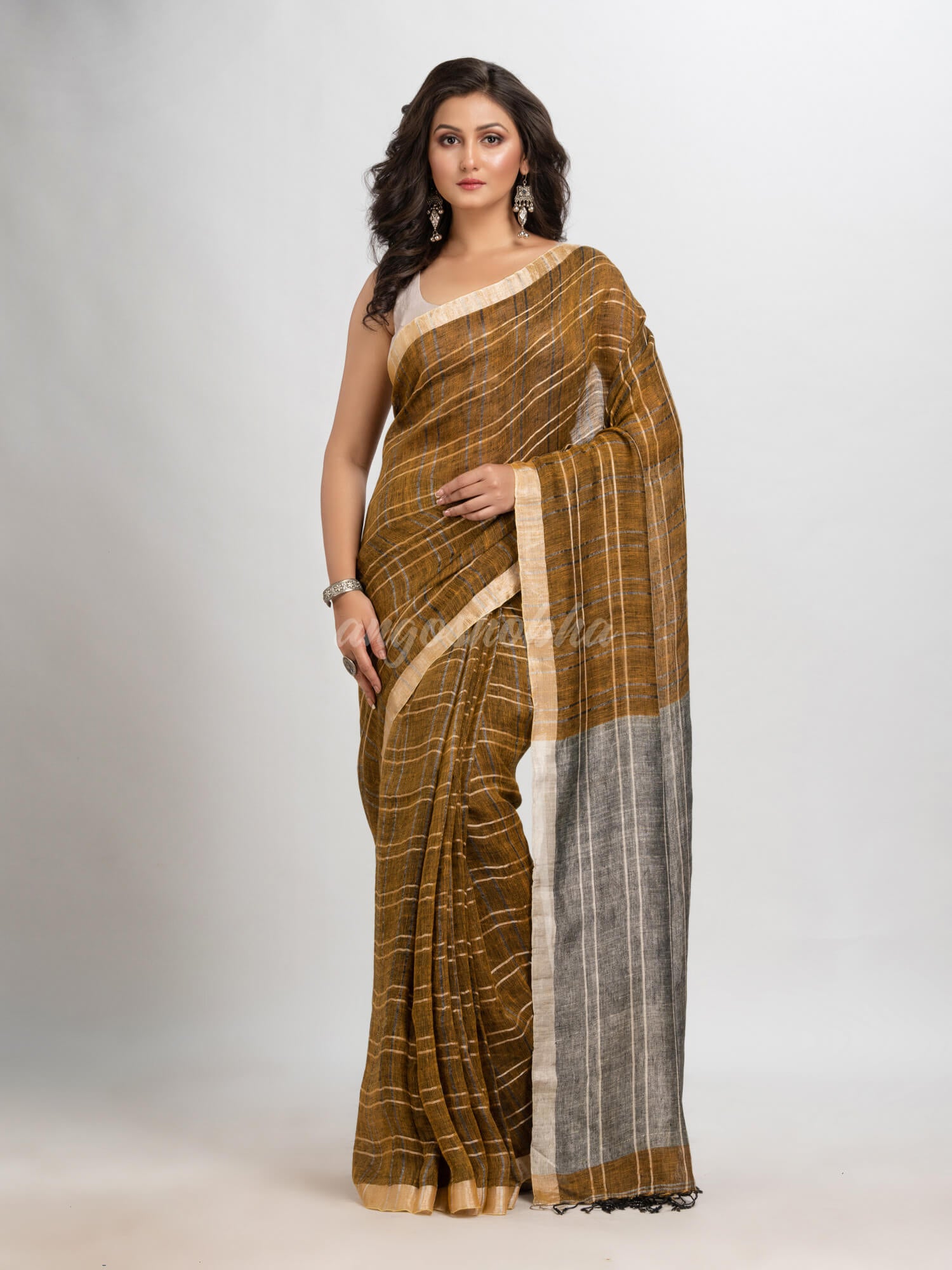 Golden brown linen with silver zari pallu  handloom saree