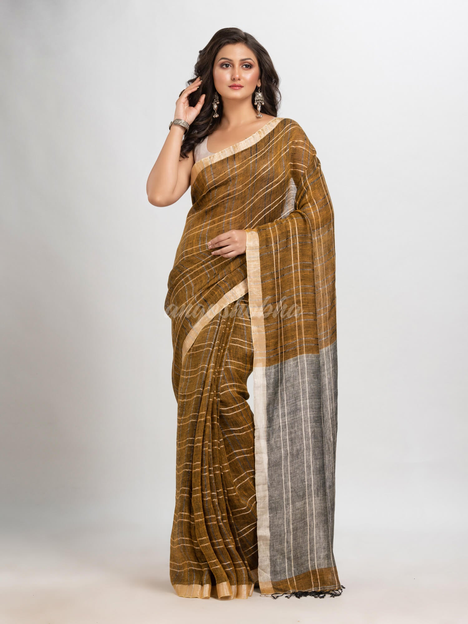 Golden brown linen with silver zari pallu  handloom saree