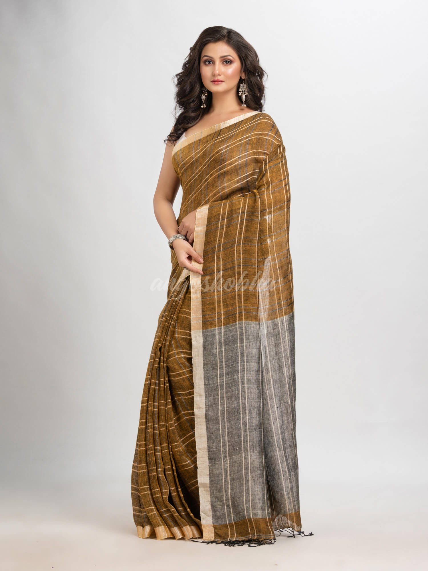 Golden brown linen with silver zari pallu  handloom saree