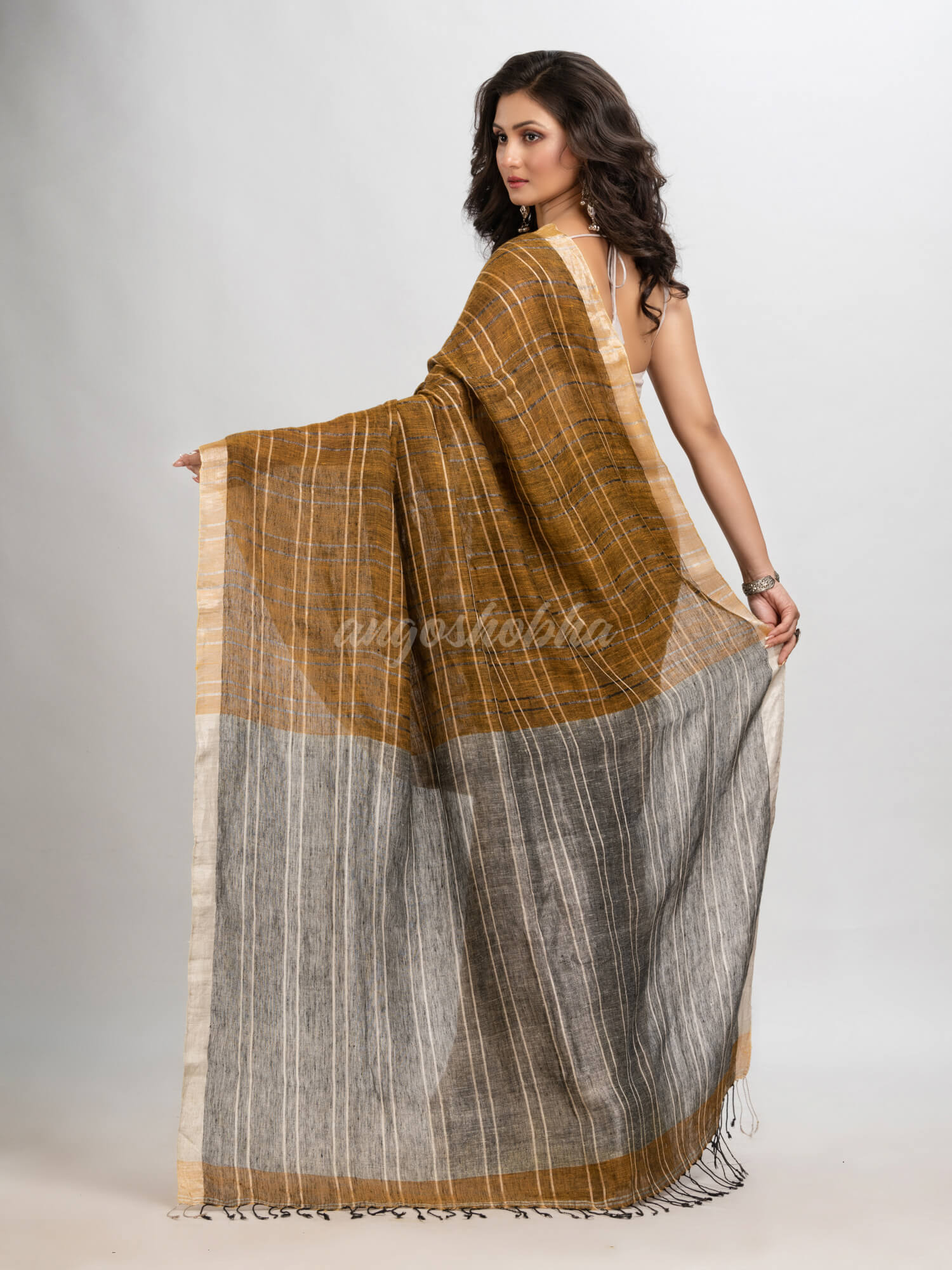 Golden brown linen with silver zari pallu  handloom saree