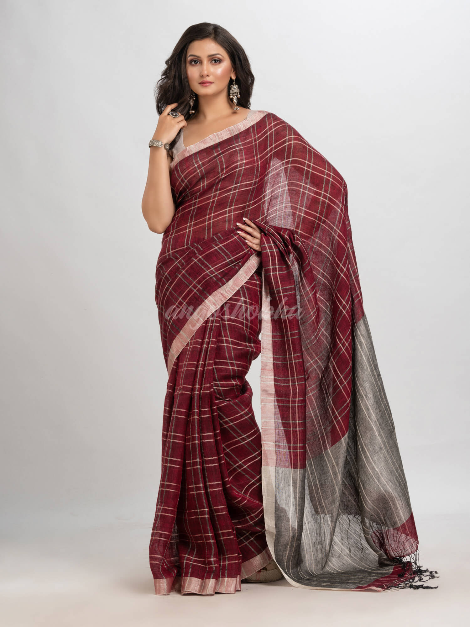 Maroon linen with silver zari  pallu handloom saree