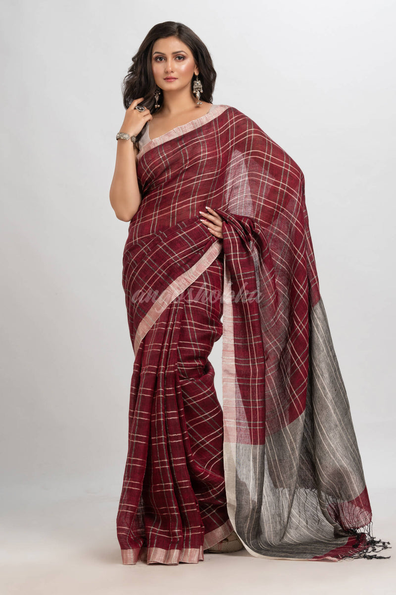 Maroon linen with silver zari  pallu handloom saree