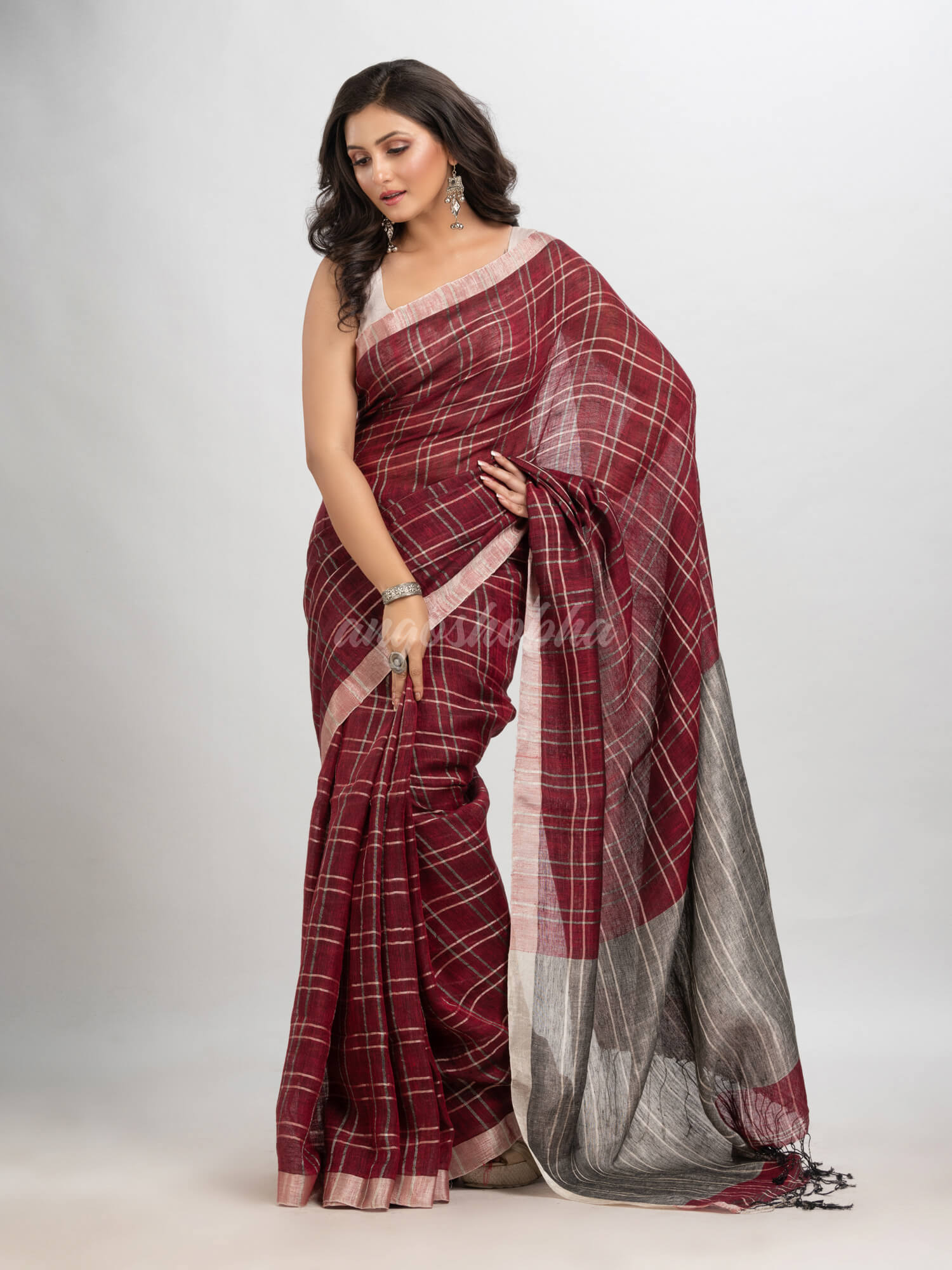 Maroon linen with silver zari  pallu handloom saree