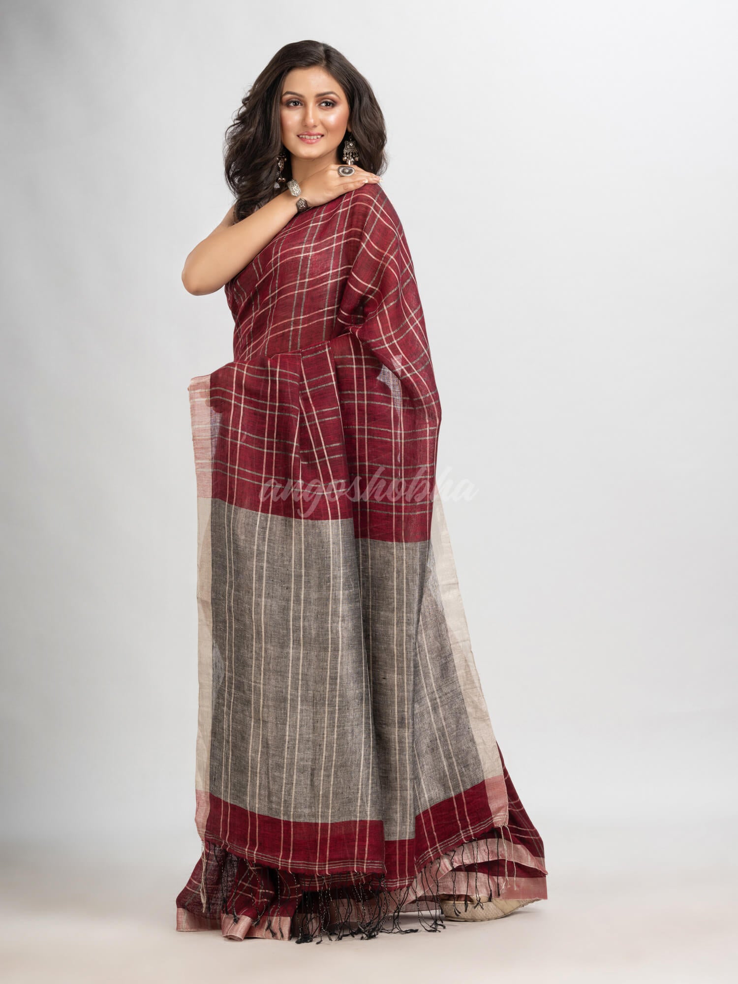 Maroon linen with silver zari  pallu handloom saree