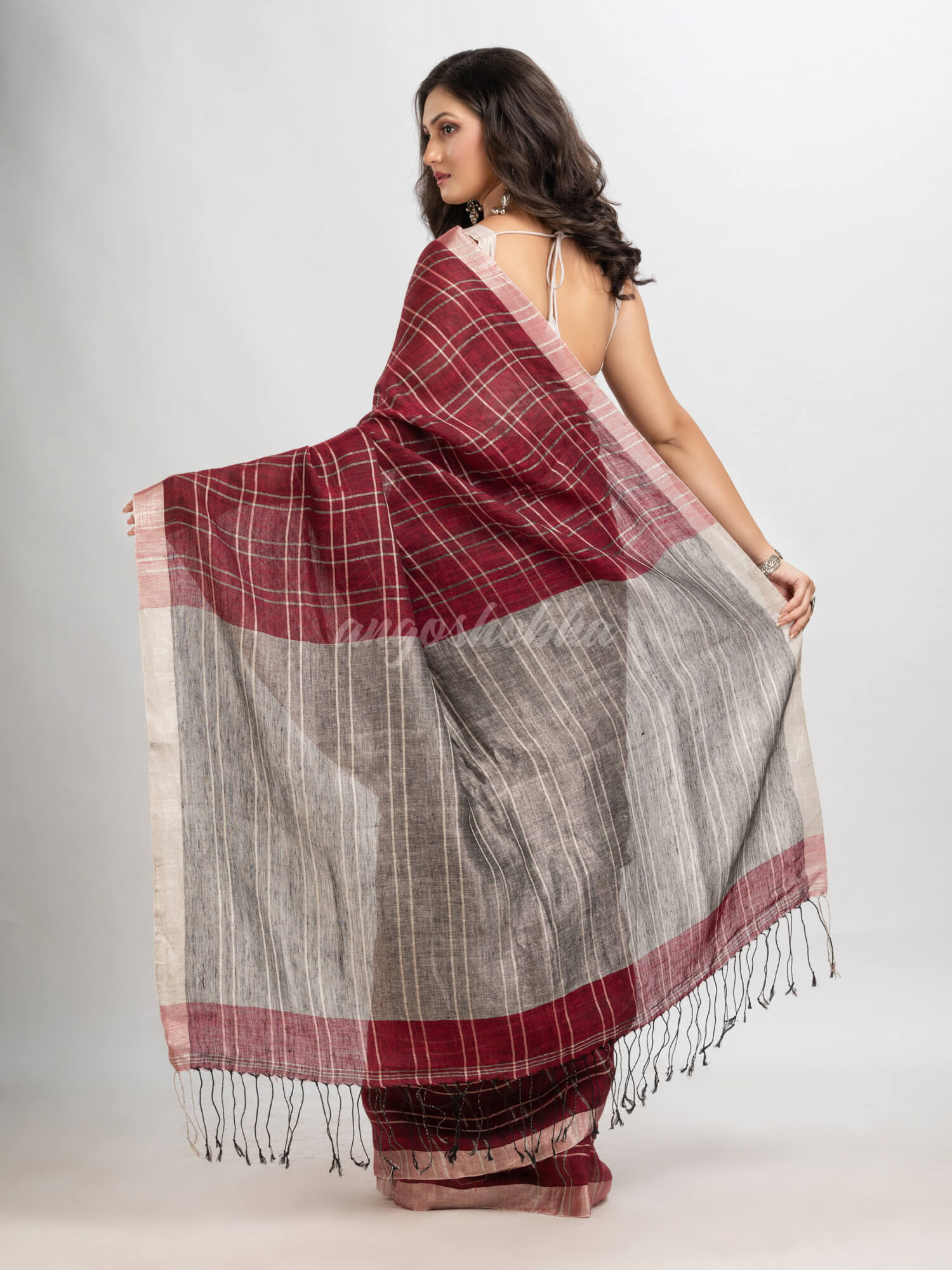 Maroon linen with silver zari  pallu handloom saree