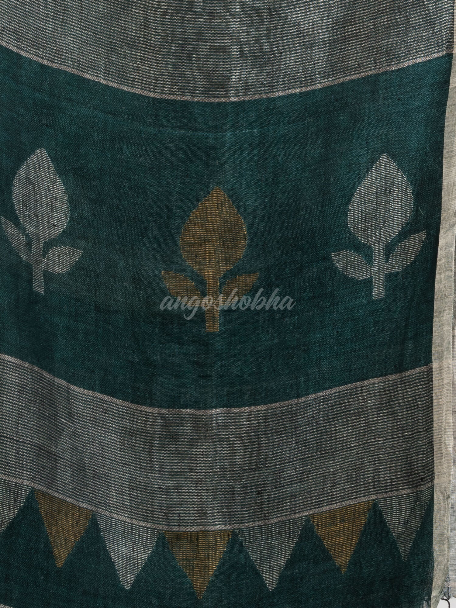 Dark bottle  green linen with zari border jamdani saree