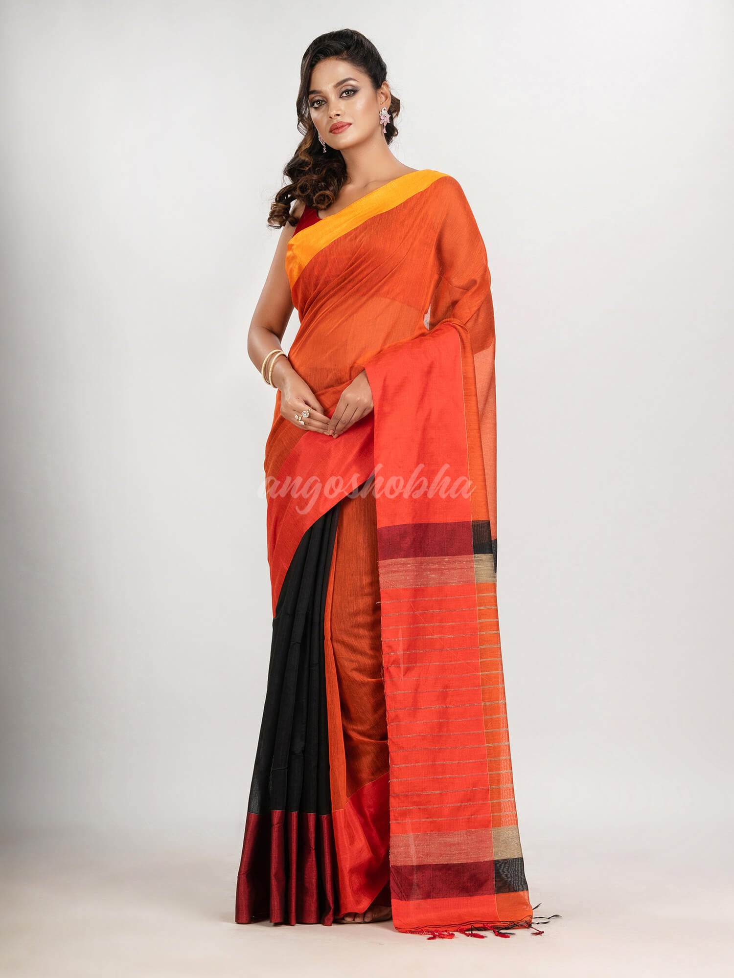 Orange & Black cotton blend half and half handloom saree