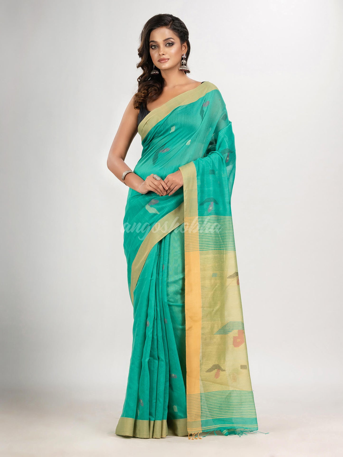 Mint green cotton blend all body boat motive with pallu muga jamdani saree