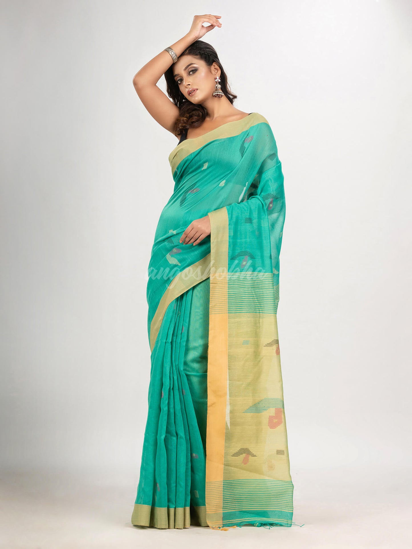 Mint green cotton blend all body boat motive with pallu muga jamdani saree