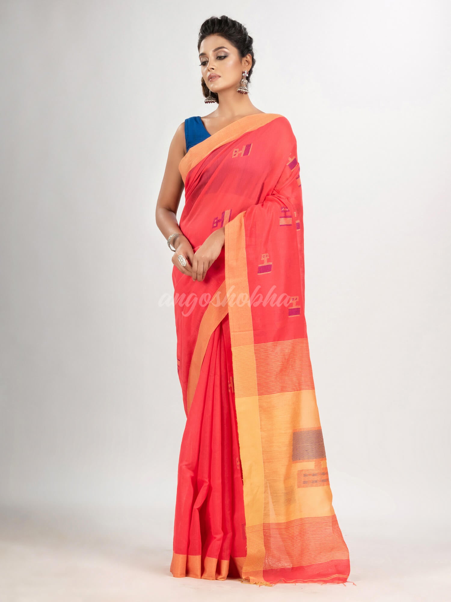Pastel red cotton blend all body laptop motive with pallu light yellow jamdani saree
