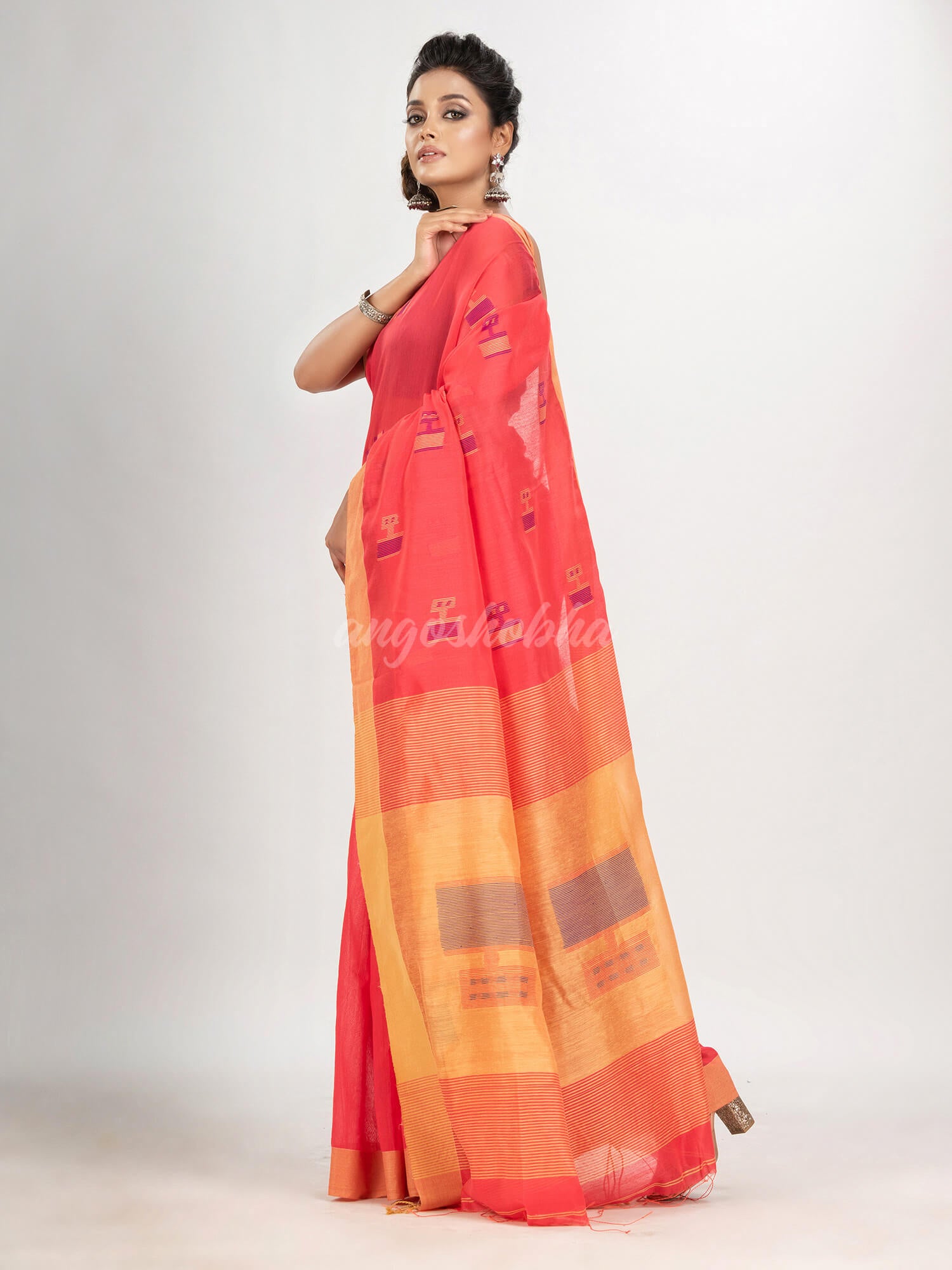 Pastel red cotton blend all body laptop motive with pallu light yellow jamdani saree