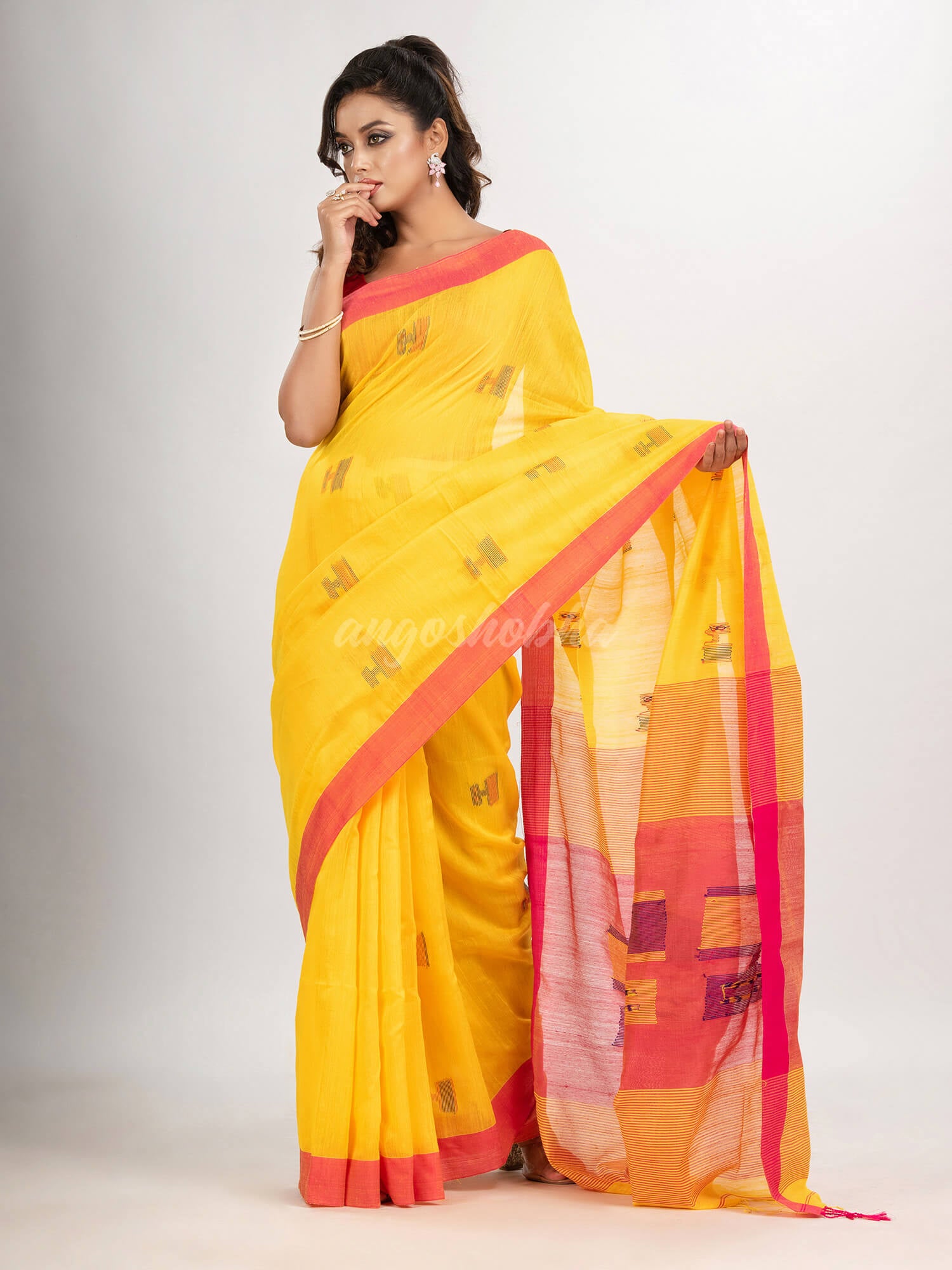 Yellow cotton blend all body laptop motive with pallu red jamdani saree