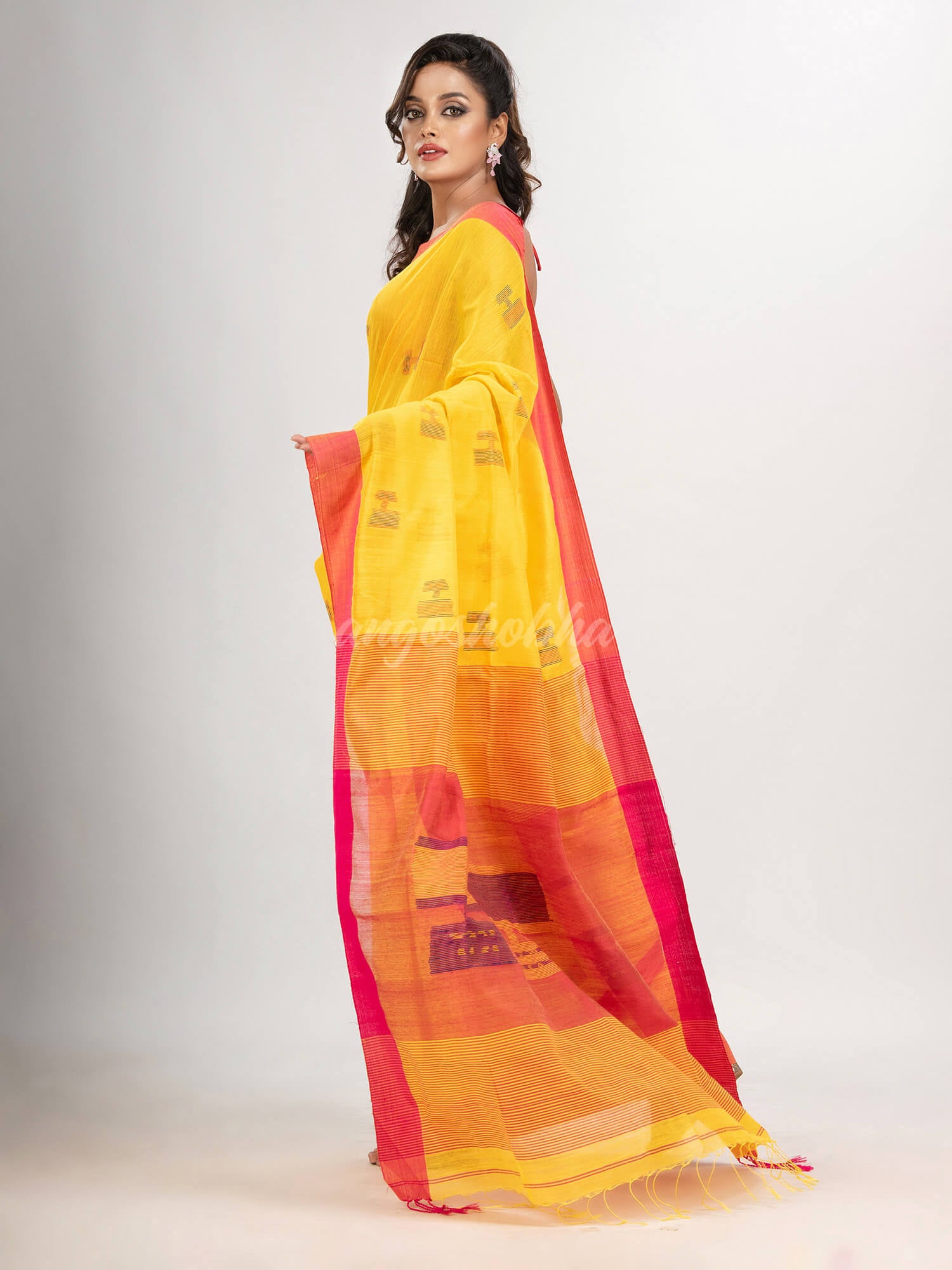 Yellow cotton blend all body laptop motive with pallu red jamdani saree