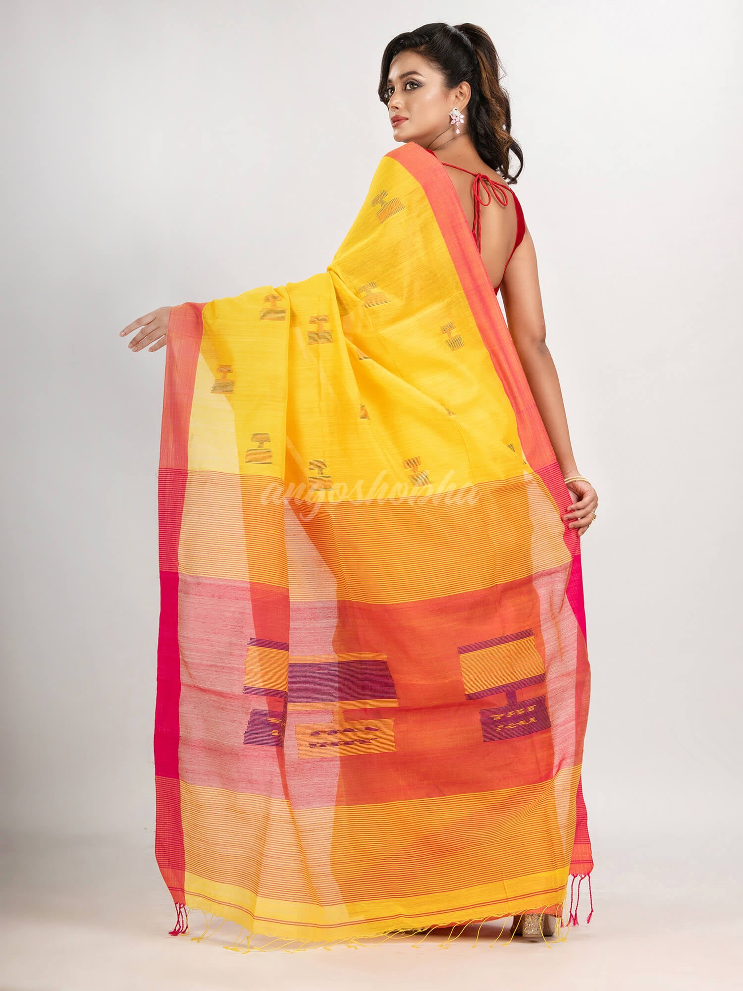 Yellow cotton blend all body laptop motive with pallu red jamdani saree