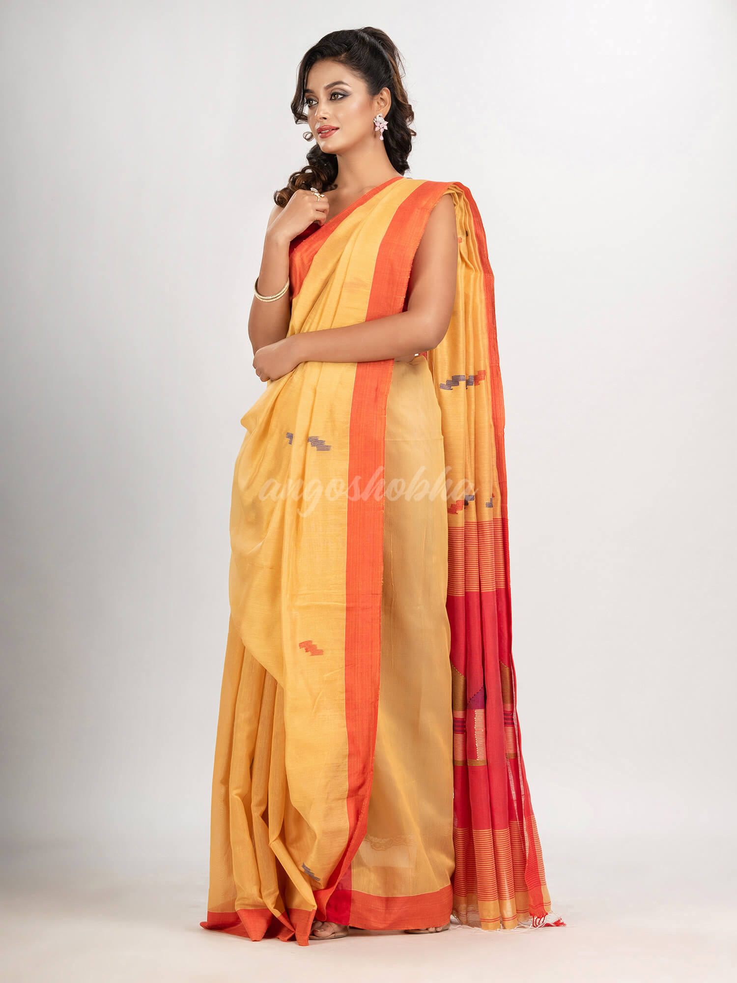 Light yellow cotton blend all body motive with red pallu hut motive jamdani saree