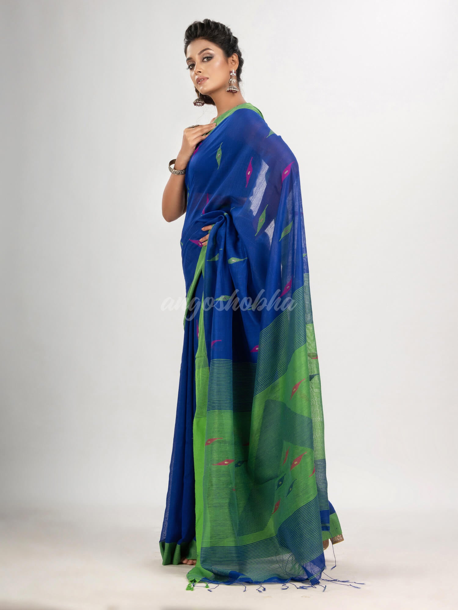 Royal blue cotton blend all body motive with green pallu jamdani saree
