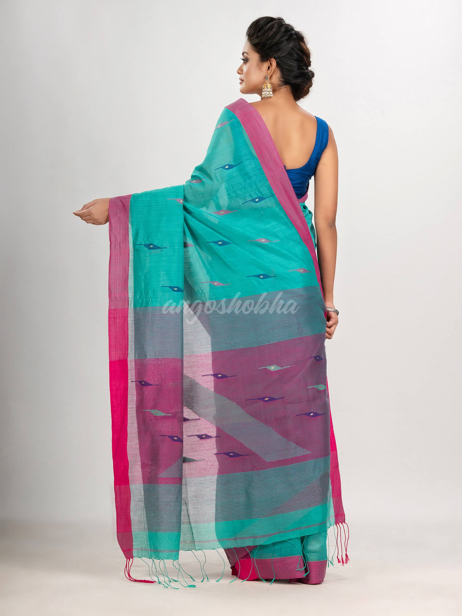 Turquoise cotton blend all body motive with pink pallu jamdani saree