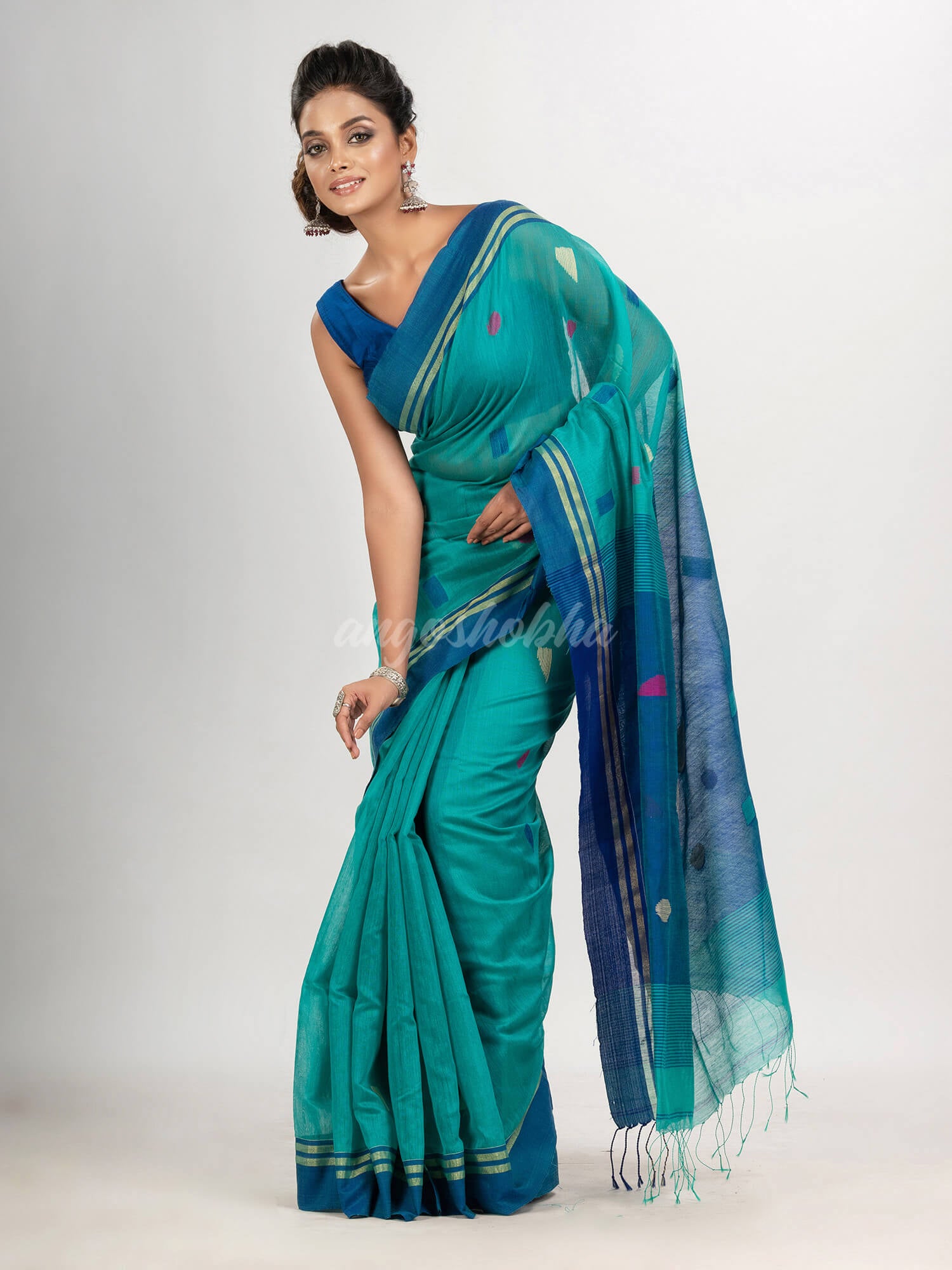 Turquoise cotton blend all body boll motive with blue pallu jamdani saree
