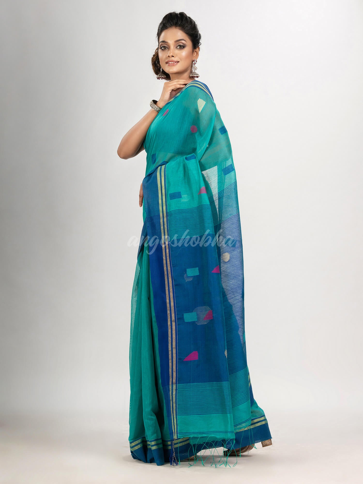 Turquoise cotton blend all body boll motive with blue pallu jamdani saree