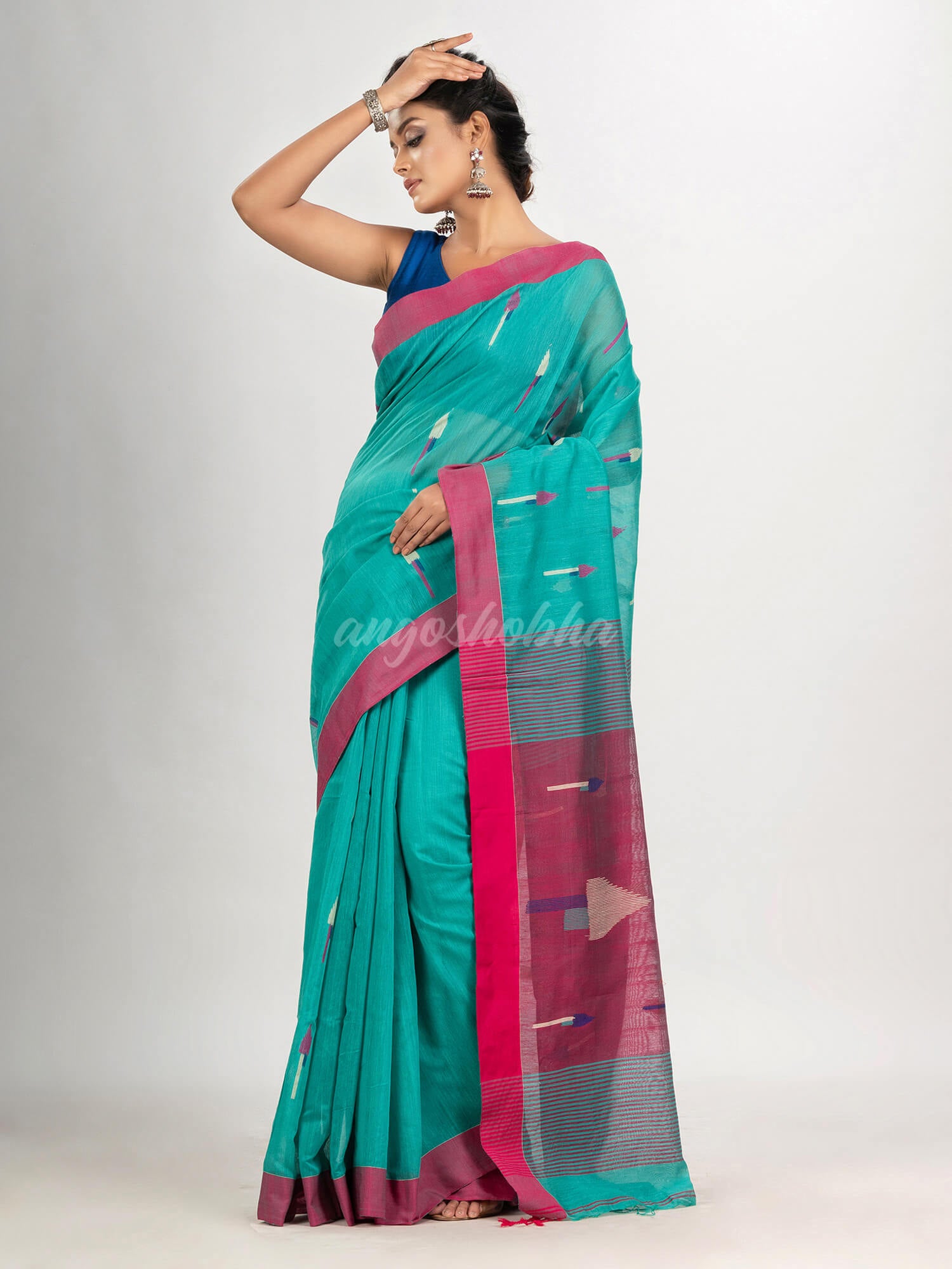 Turquoise cotton blend all body arrow motive with pink pallu jamdani saree
