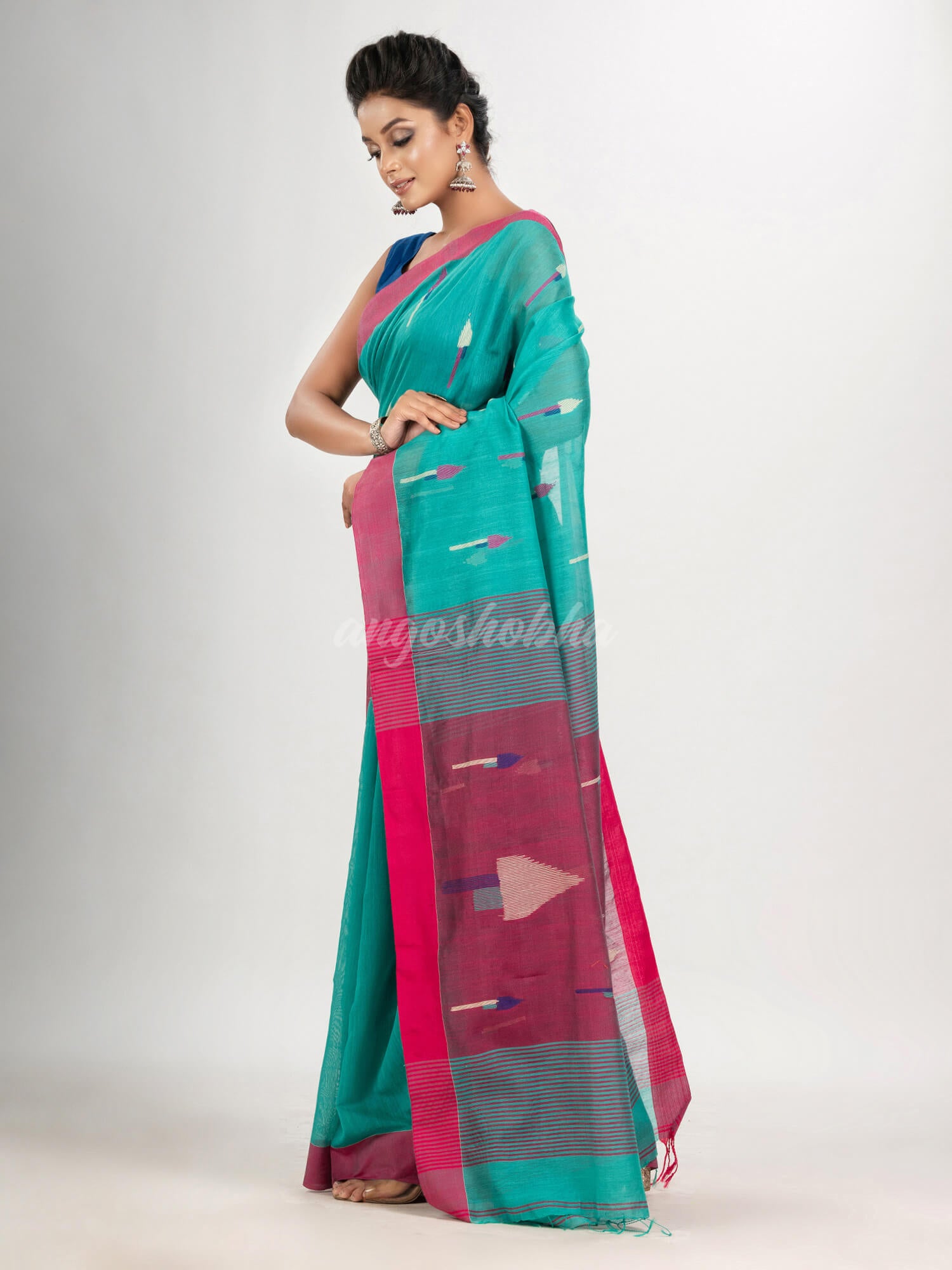 Turquoise cotton blend all body arrow motive with pink pallu jamdani saree