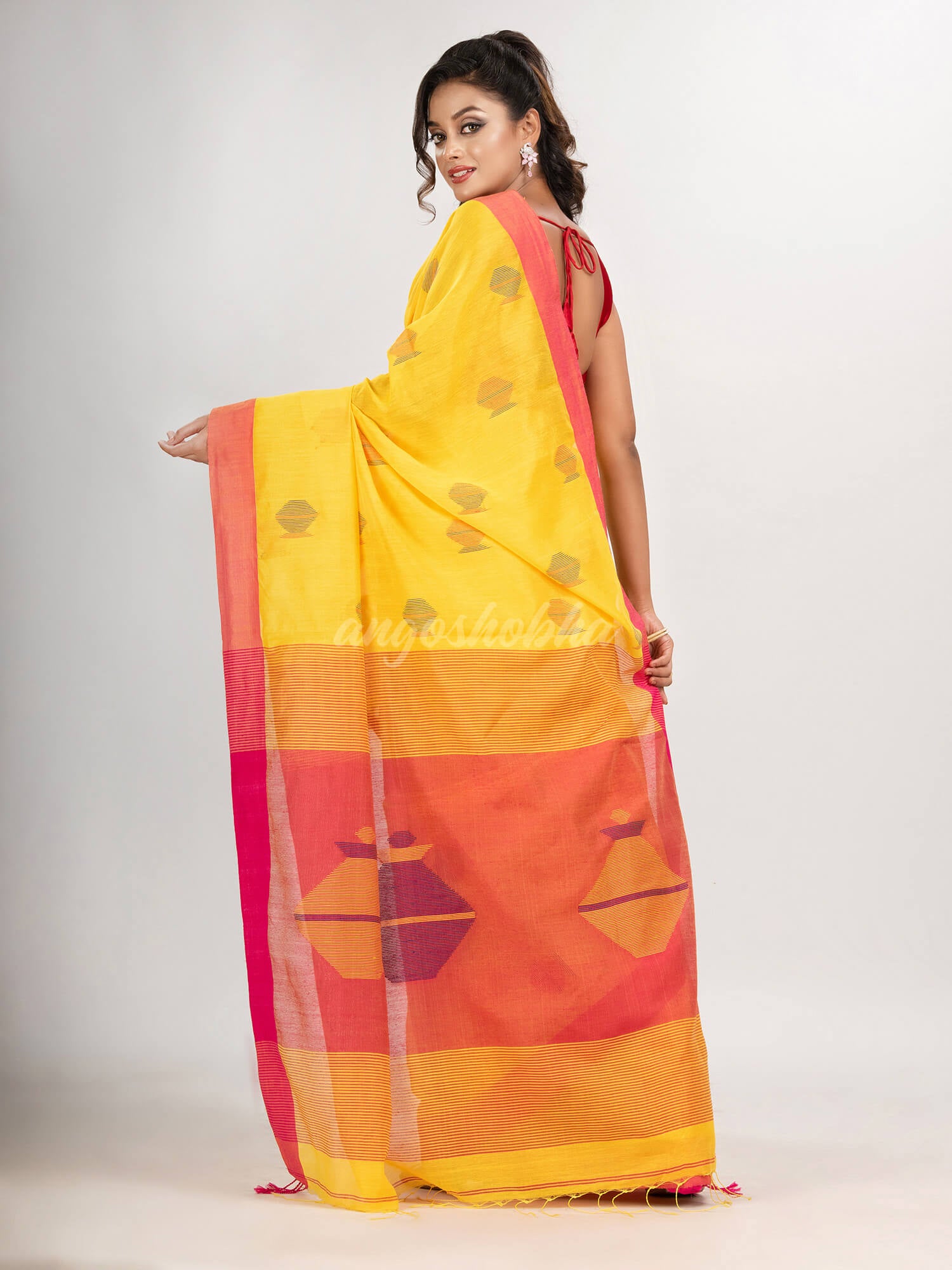 Yellow cotton blend all body noddle motive with pink pallu jamdani saree