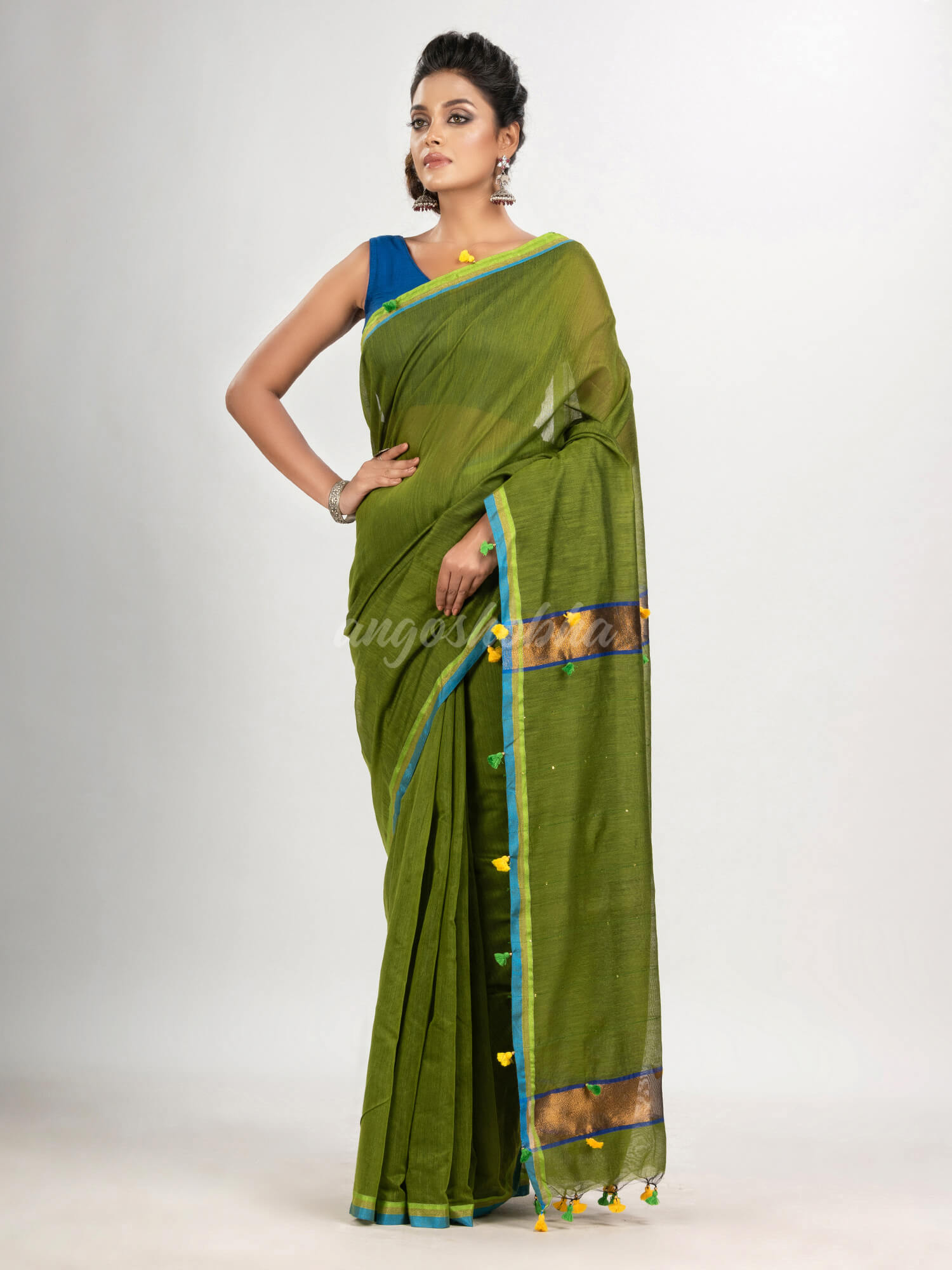 Olive green cotton blend with pompom handloom saree