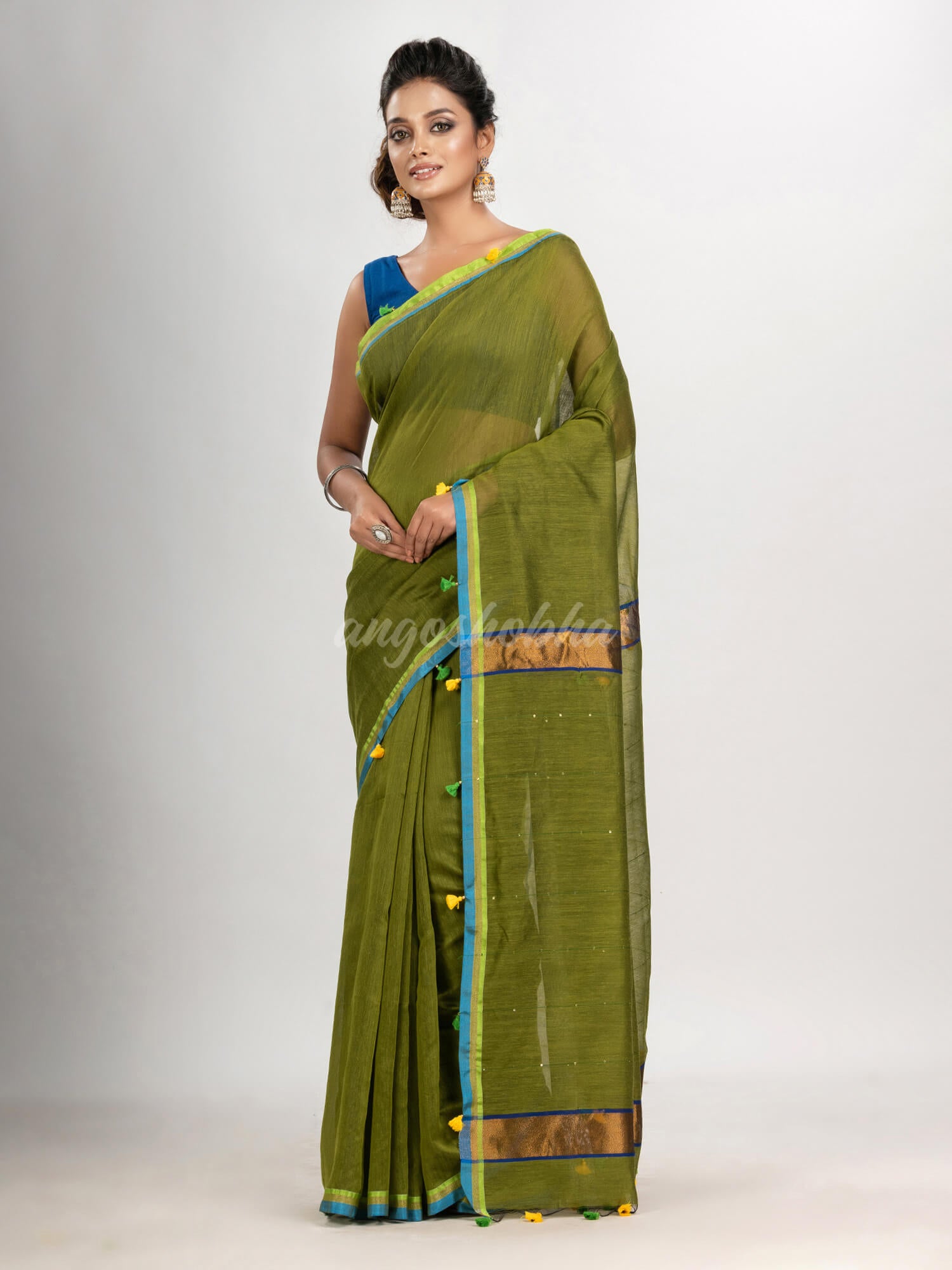 Olive green cotton blend with pompom handloom saree