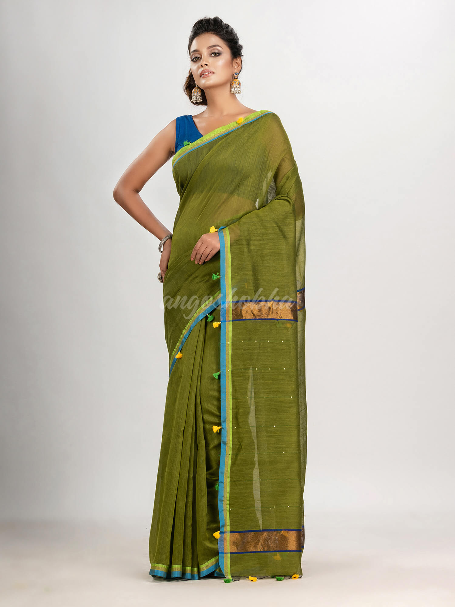 Olive green cotton blend with pompom handloom saree
